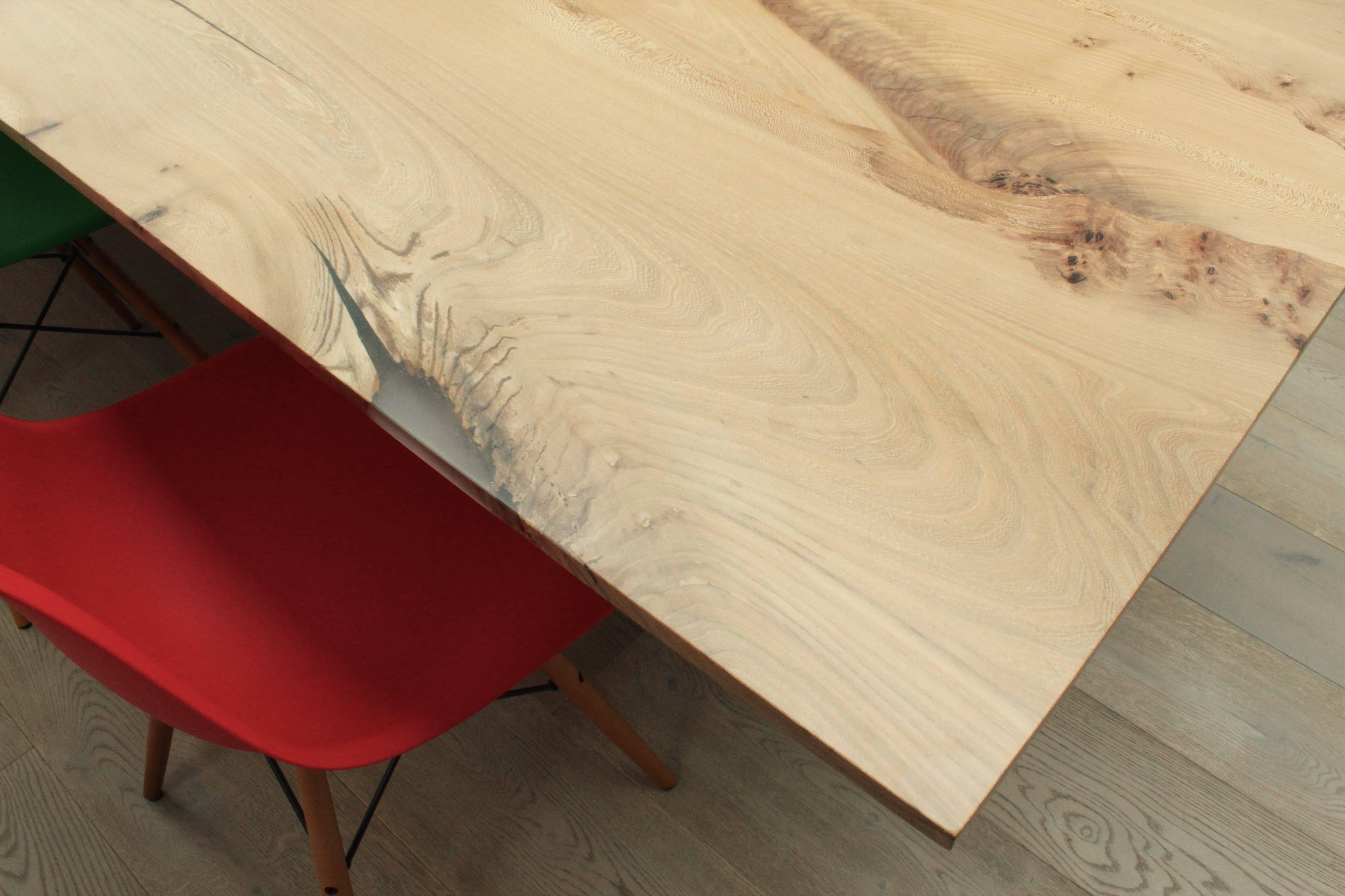 Hand-Crafted Book-matched Elm Dining Table with Bleached, White Oil. inverted live edge legs For Sale