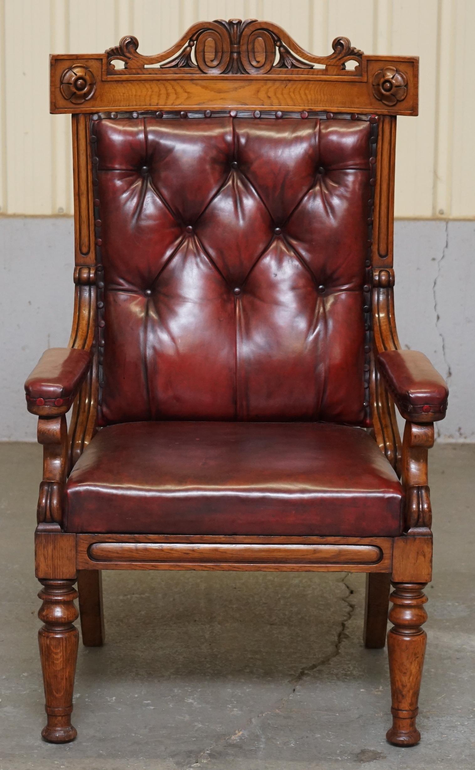 We are delighted to offer for sale this stunning original Royal Estate stamped oxblood leather and oak circa 1840 throne armchair

A very good looking well made and decorative throne armchair. This chair bares the Royal Estate stamp to the rear,
