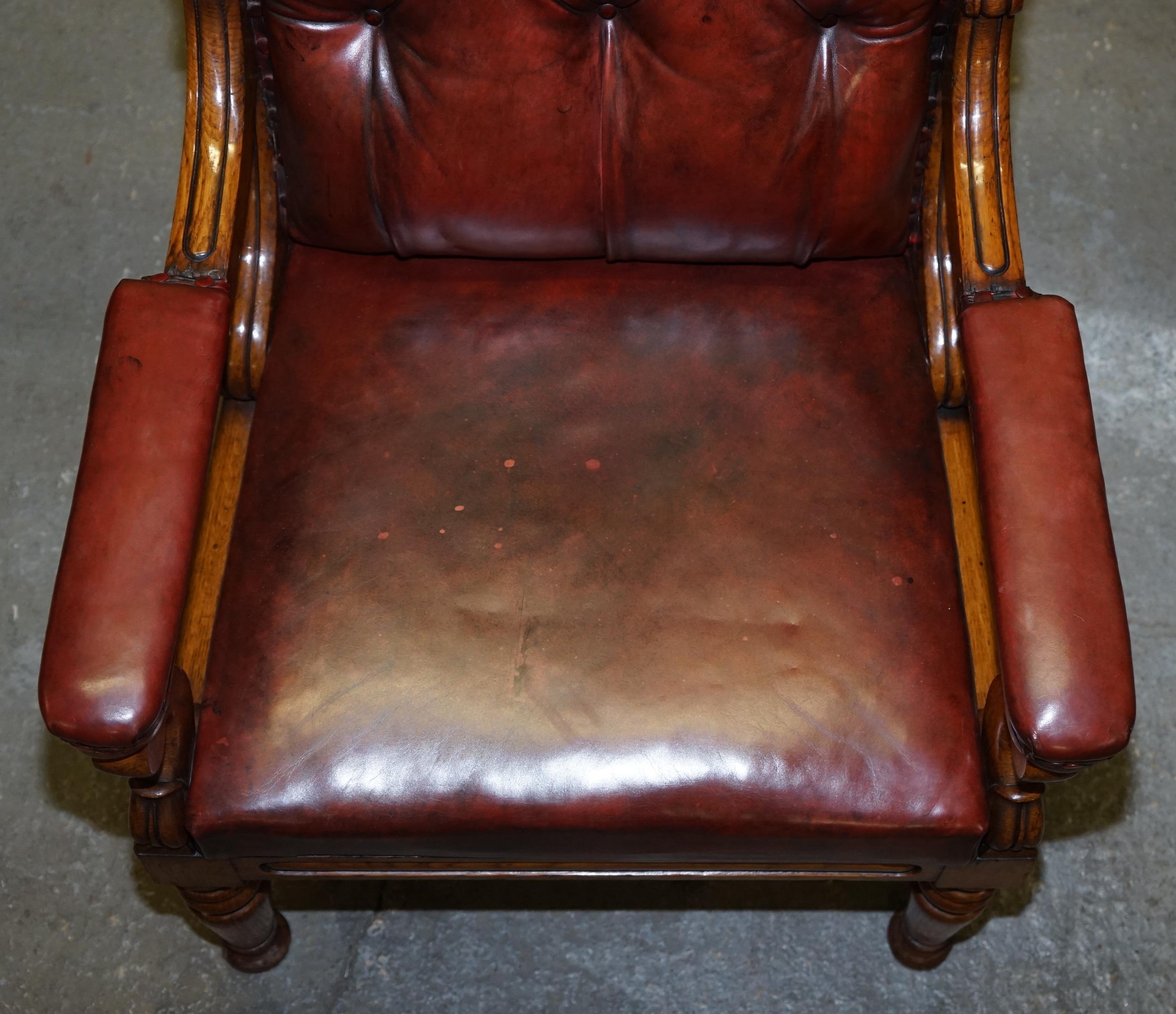 Hand-Crafted English Estate circa 1840 Royal Crown Stamped Oxblood Leather Throne Armchair For Sale