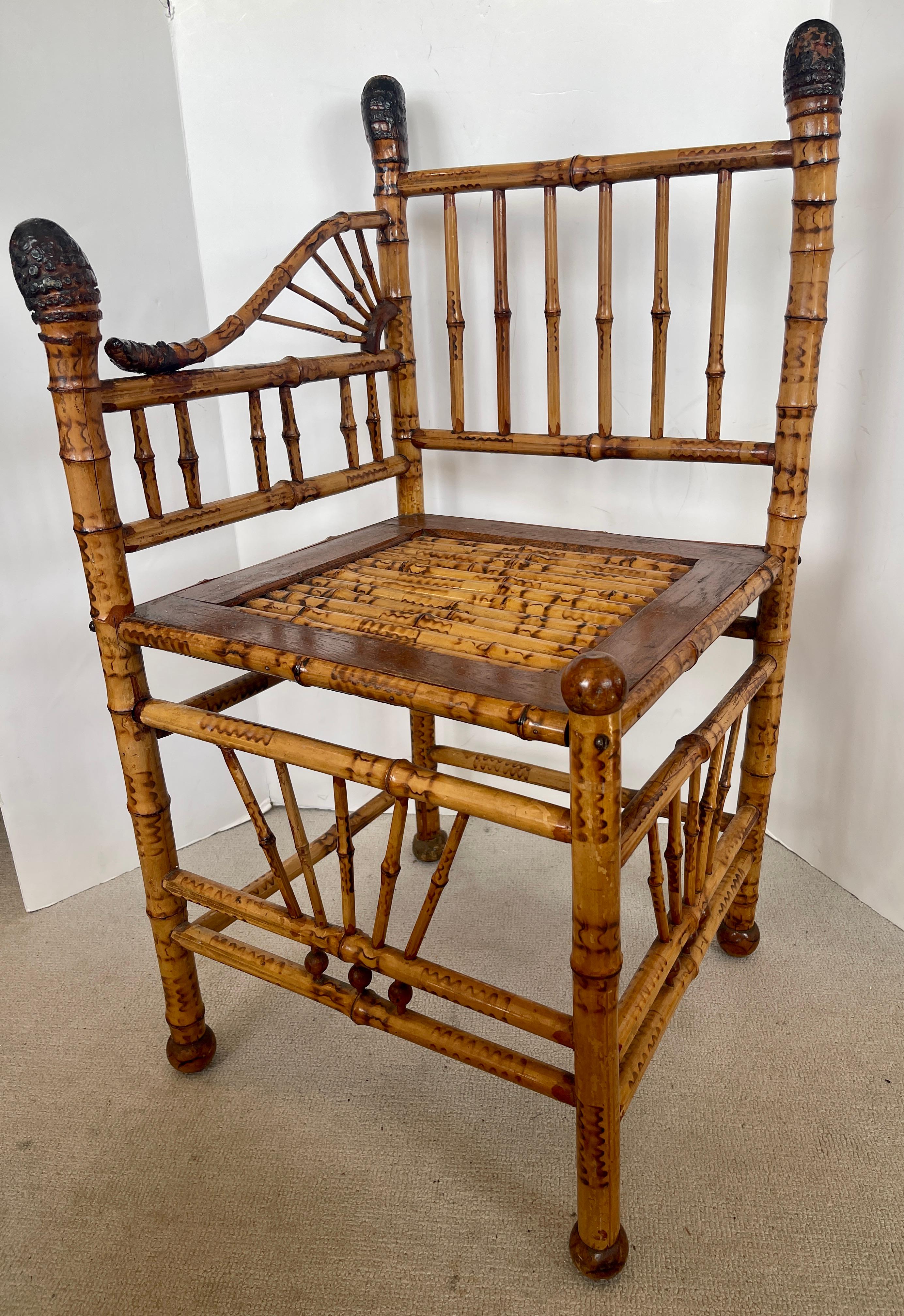 
Just arrived, this wonderful example of an English Esthetic Movement Root and Scorched Bamboo Corner Chair, 1890-1900
The intricate and delicate workmanship of this corner chair is exquisite
.Very good to excellent antique  condition, consistent