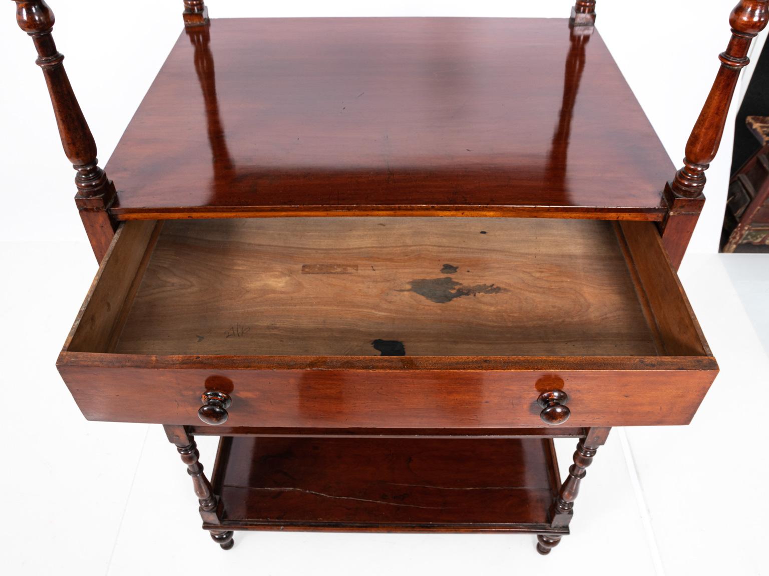 Five shelf English étagère with turned detail and finials, circa 1840s. The piece also features one drawer. Please note of wear consistent with age.
