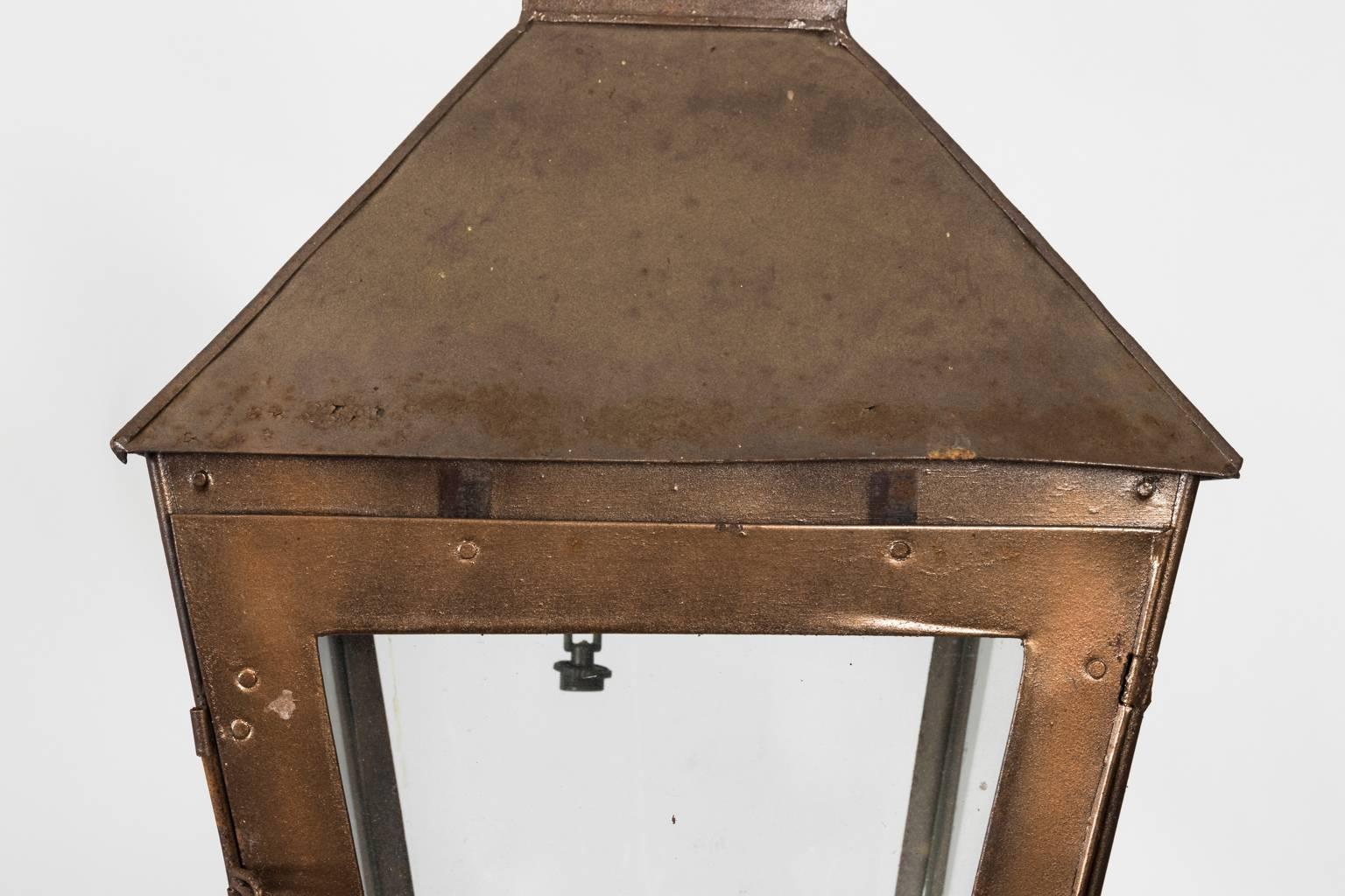 Contemporary English exterior lantern with four panes and one single light in a weathered finish.
 