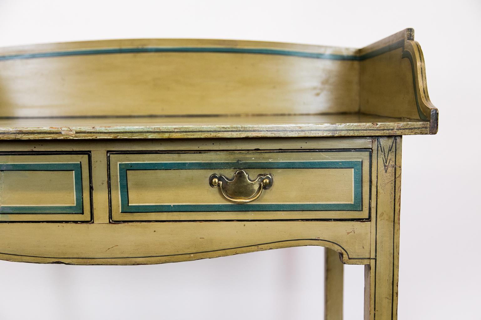 English faux painted side table with gallery has a drawer front painted to simulate crossbanding and ebony inlay. The top is simulated to look like marble.