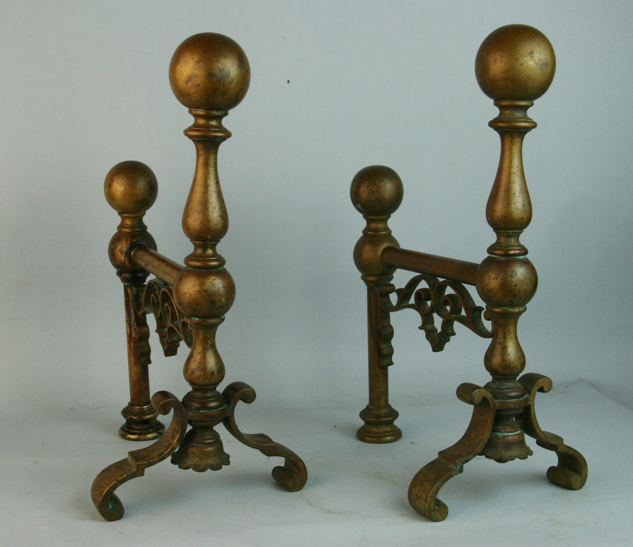 1353 pair English brass firedogs/tool rests.