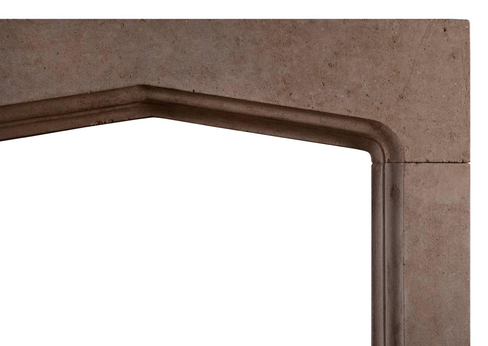 An English stone fireplace in the Gothic manner. The moulded jambs surmounted by arched frieze, circa 1900.


Measure: 
Shelf Width:	1395 mm      	54 7/8 in
Overall Height:	1125 mm      	44 1/4 in
Opening Height:	920 mm      	36 1/4 in
Opening