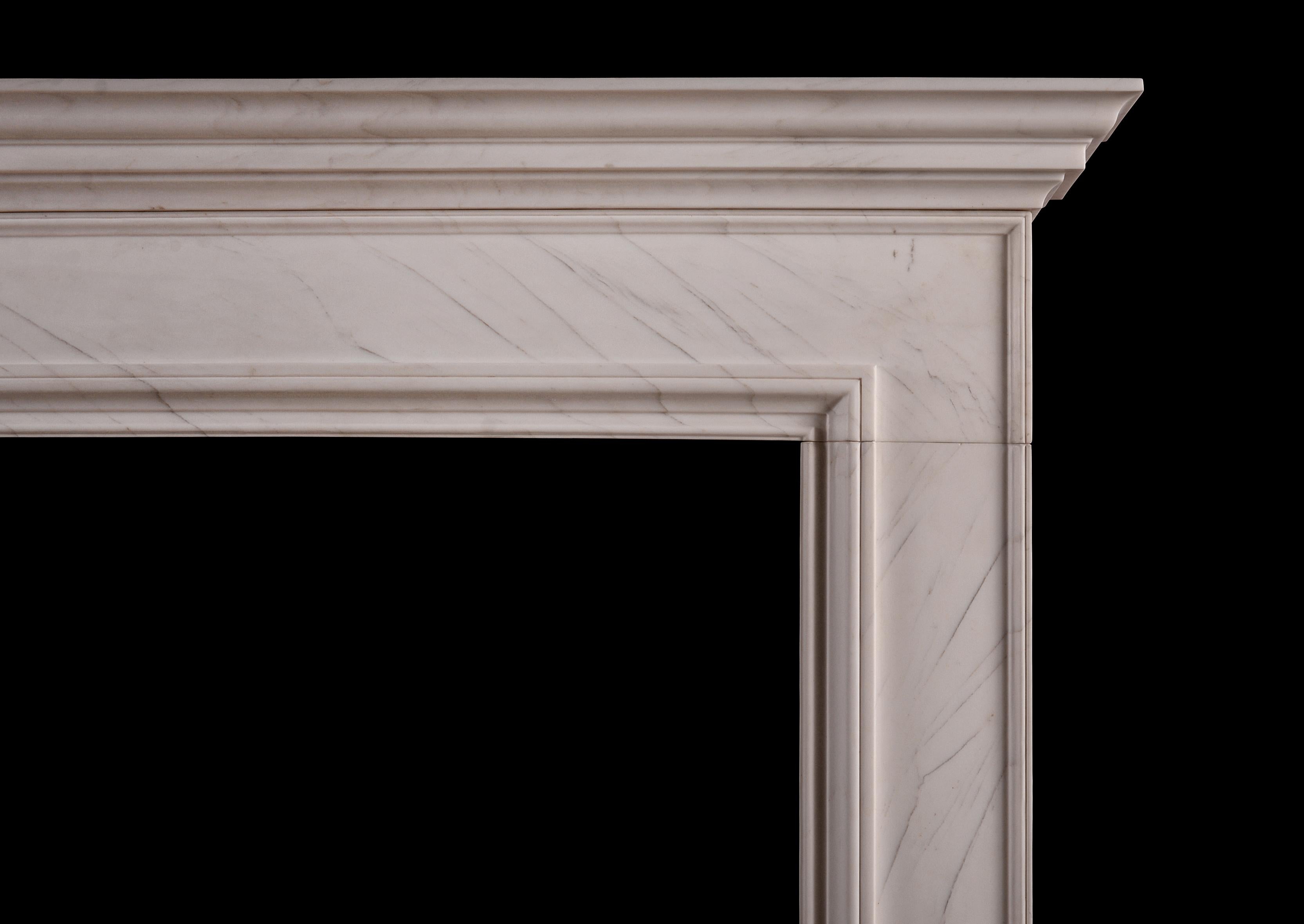 A simple white marble fireplace of architectural form. The moulded frieze and jambs surmounted by moulded shelf above. English design. Modern. 

Shelf Width: 1545 mm 60 ?