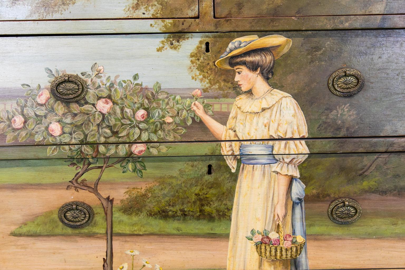 English five-drawer painted chest, the top painted with a lady in a garden setting, picking roses from a tree to fill her basket. The base has a scalloped apron, on tapered feet.