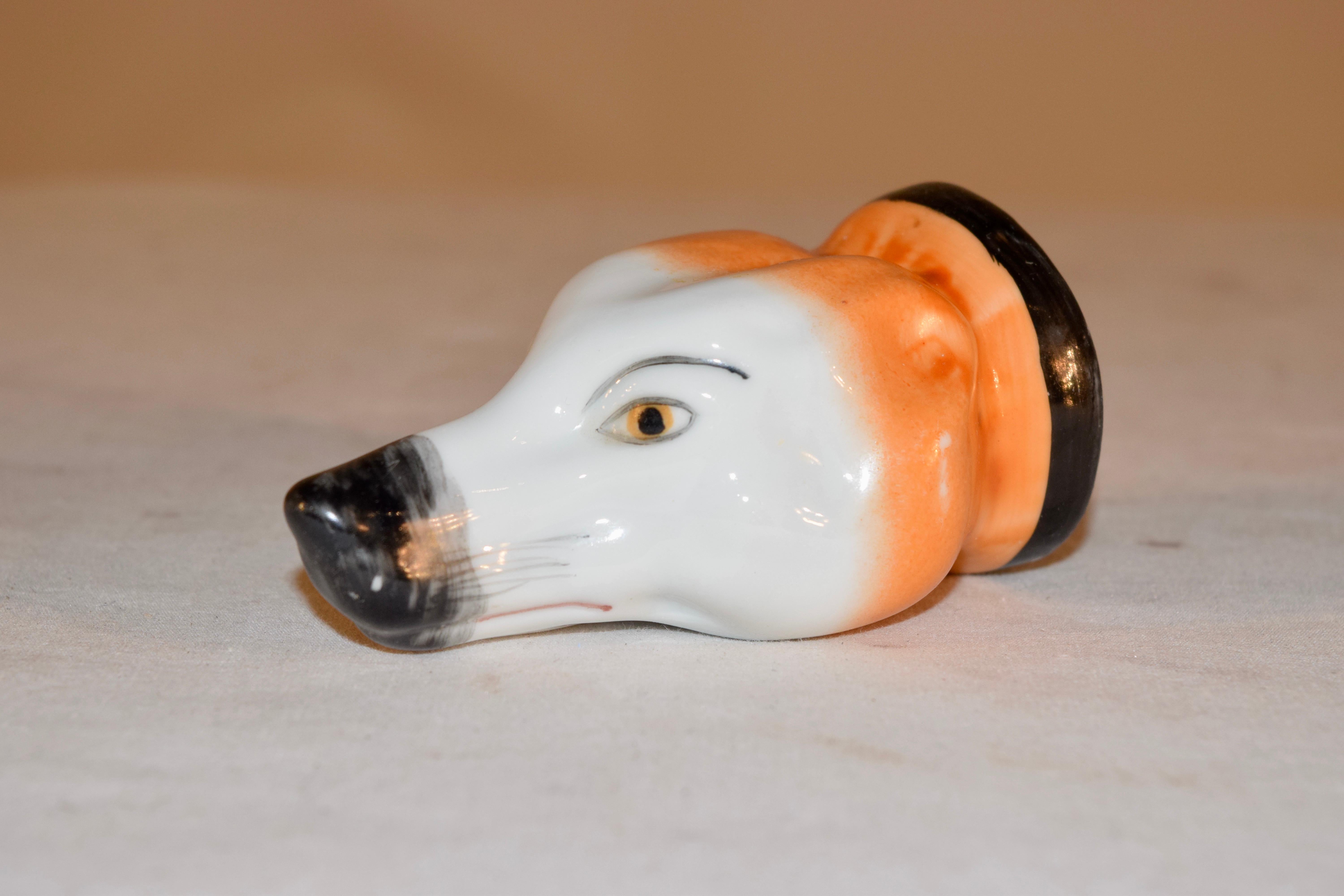 English Staffordshire stirrup cup I the form of a fox head, circa 1960s. To find originals of these is very rare, as most were broken over the years. They were used in fox hunting for riders to have a drink before a ride. Very interesting piece for