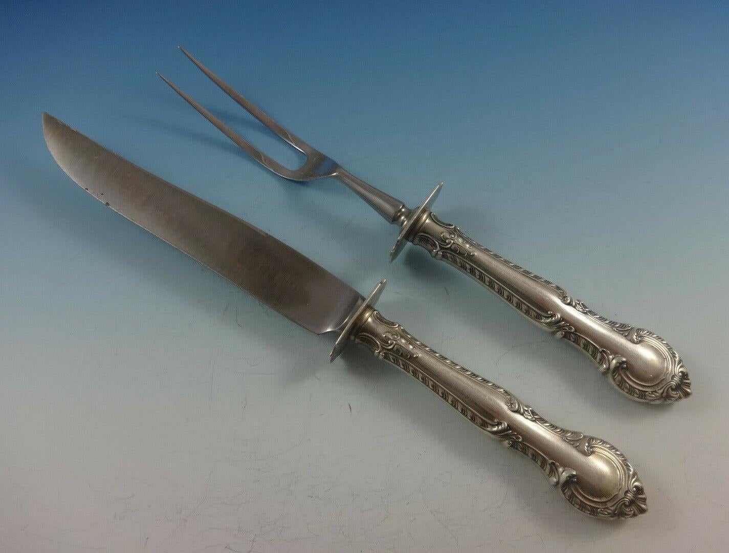 Set di posate in argento sterling ENGLISH GADROON BY GORHAM - 53 pezzi. Questo set comprende:


8 COLTELLI, 8 7/8