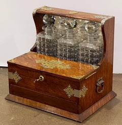 English Gaming Compendium and Tantalus of Oak with Three Decanters