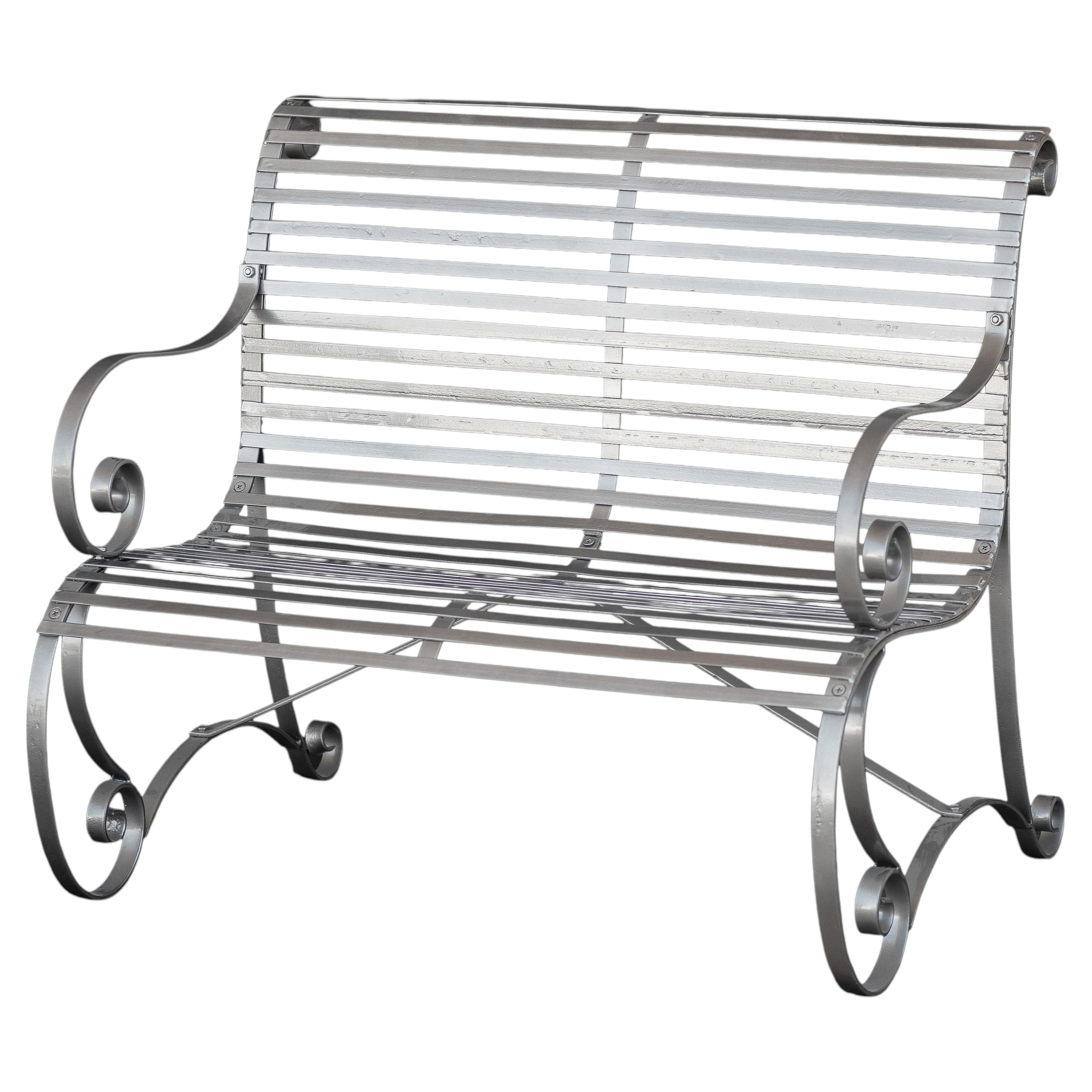 English Garden Bench Seat of Painted Wrought Iron with Scrollwork Design
