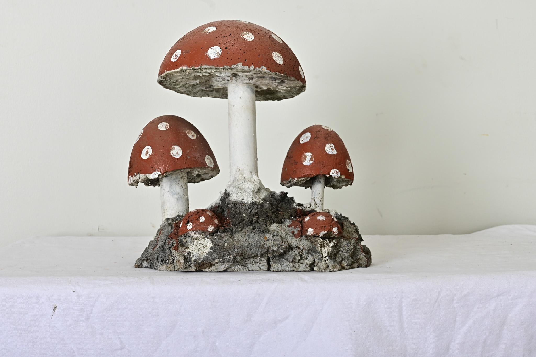 A curious and whimsical family of toadstools made in England to populate your garden or patio. Handcrafted from reconstituted stone and metal pipe with hand-painted decoration. Please view the detailed images.