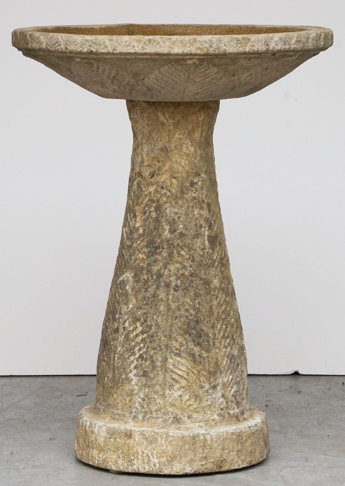 A handsome English bird bath (or birdbath) of composition stone, featuring a 18 3/4 inch diameter basin top (circular) set upon a conical base with foliate design.

Perfect for a garden room or conservatory!.


 