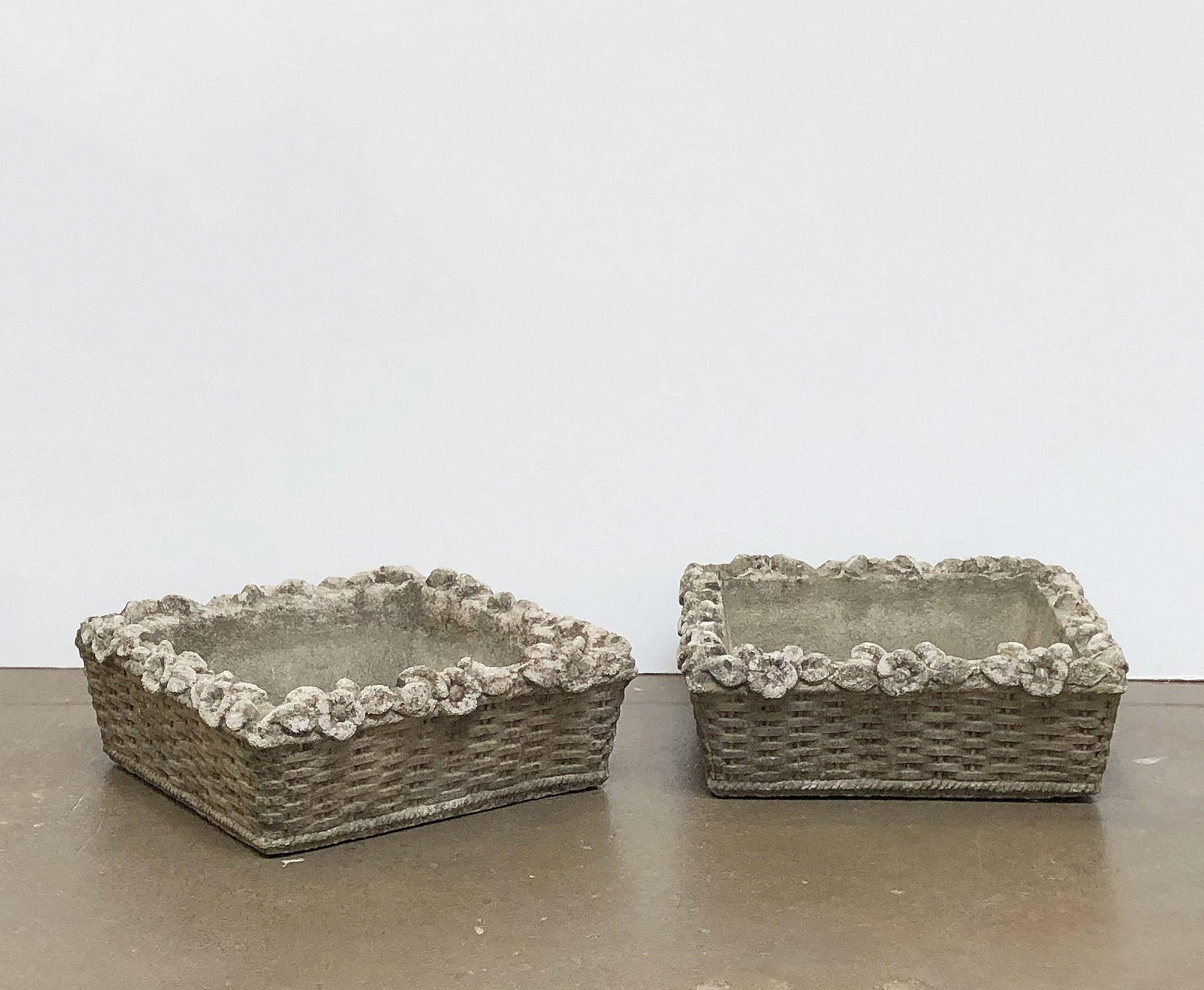 A pair of fine square English garden low planter pots or troughs of composition stone, each planter featuring a foliate relief over a basket weave design around the outside circumference and three drainage holes in the base.

An excellent addition