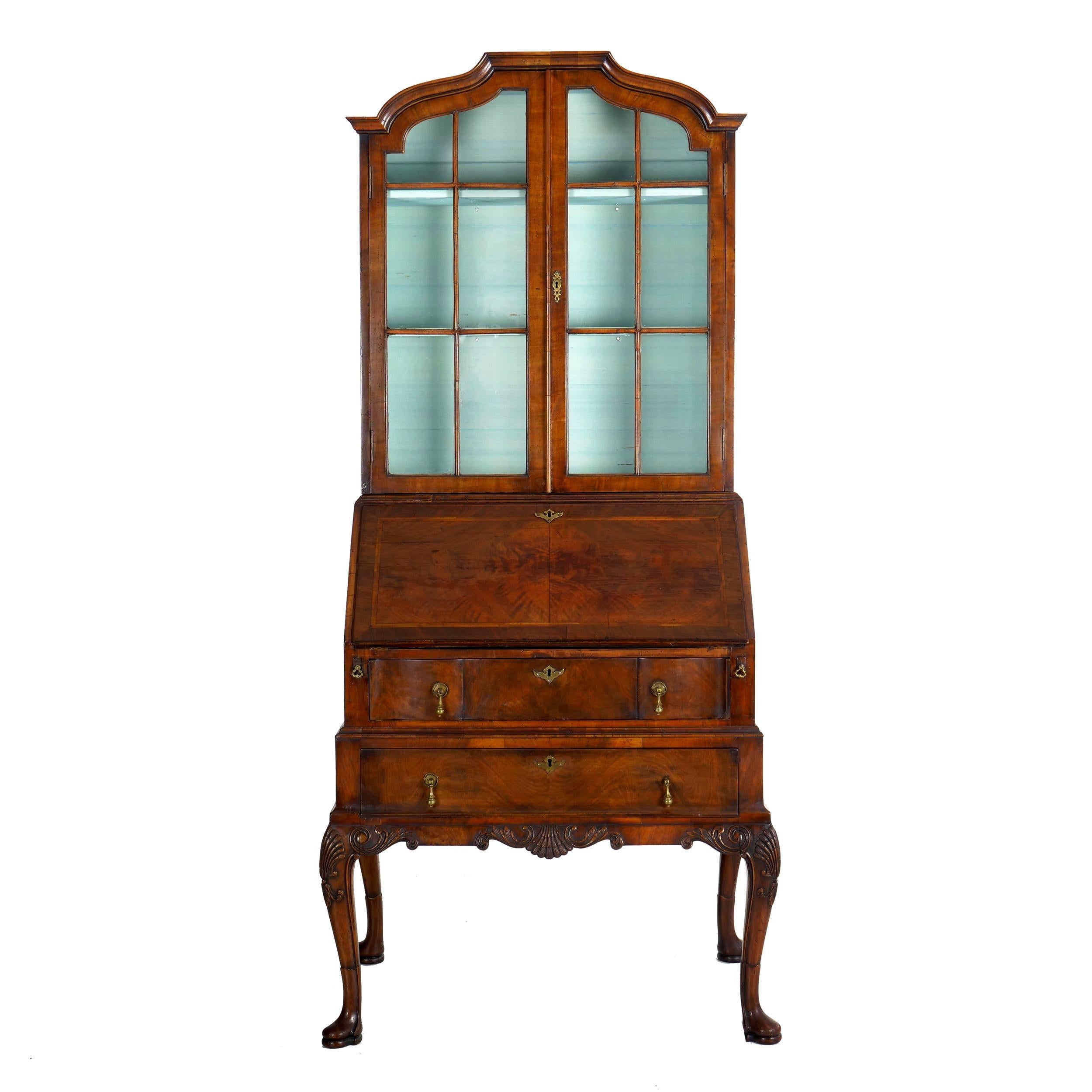 George I style burl walnut secretary desk with bookcase
England, circa late 19th century with earlier components
Item # 006YIJ27P 

An absolutely gorgeous secretary desk designed in the George I taste, it was probably executed during the last