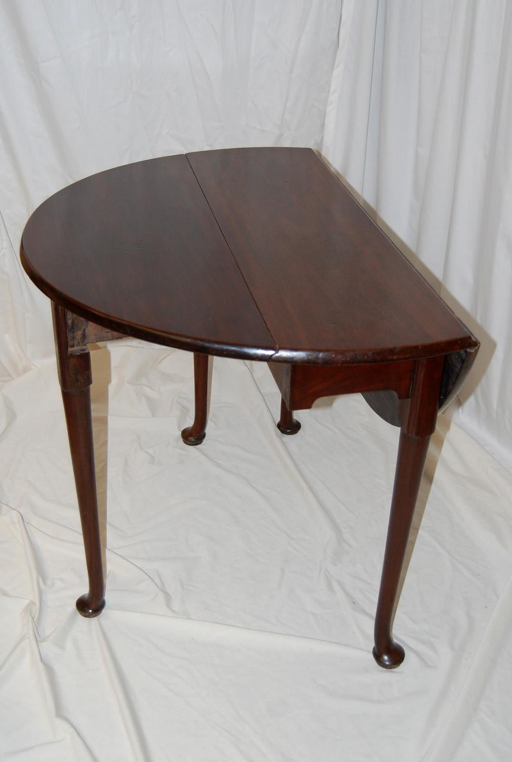 18th Century English George II Mahogany Dropleaf Pad Foot Thirty Six Inch Oval Table For Sale