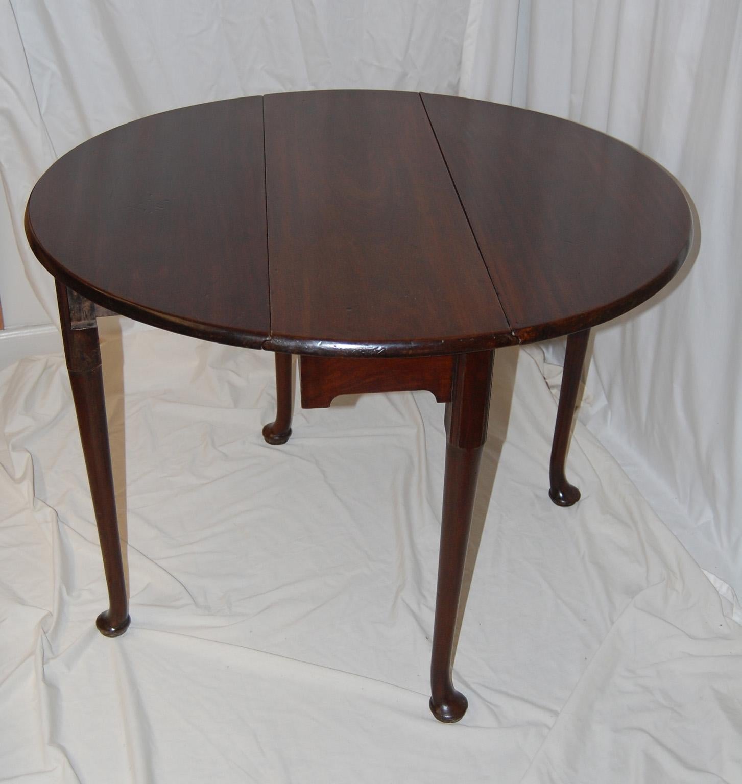 English George II Mahogany Dropleaf Pad Foot Thirty Six Inch Oval Table For Sale 1