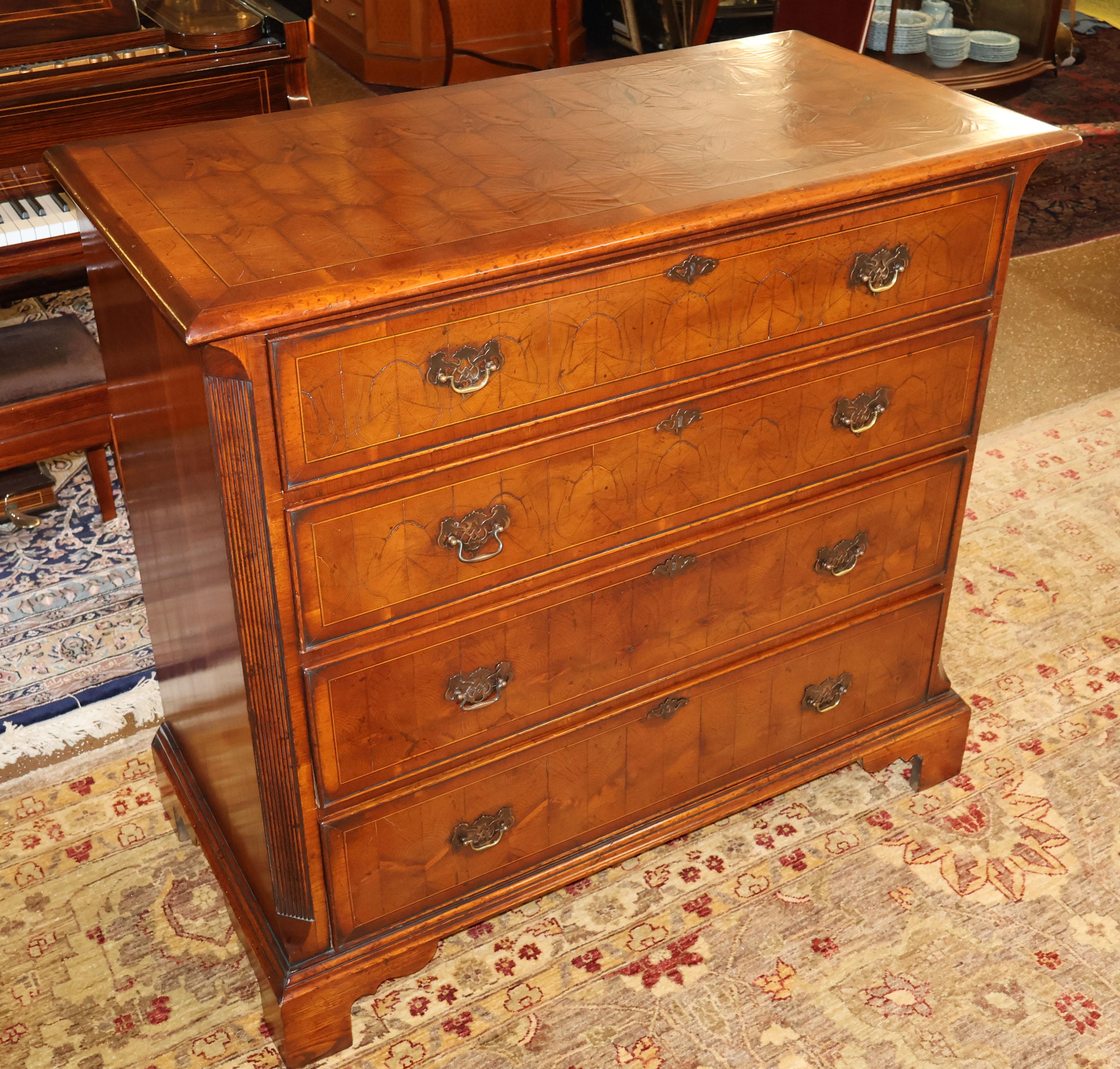​Gorgeous English George II Style Burled Oysterwood Dresser Chest of Drawers

Dimensions : 46