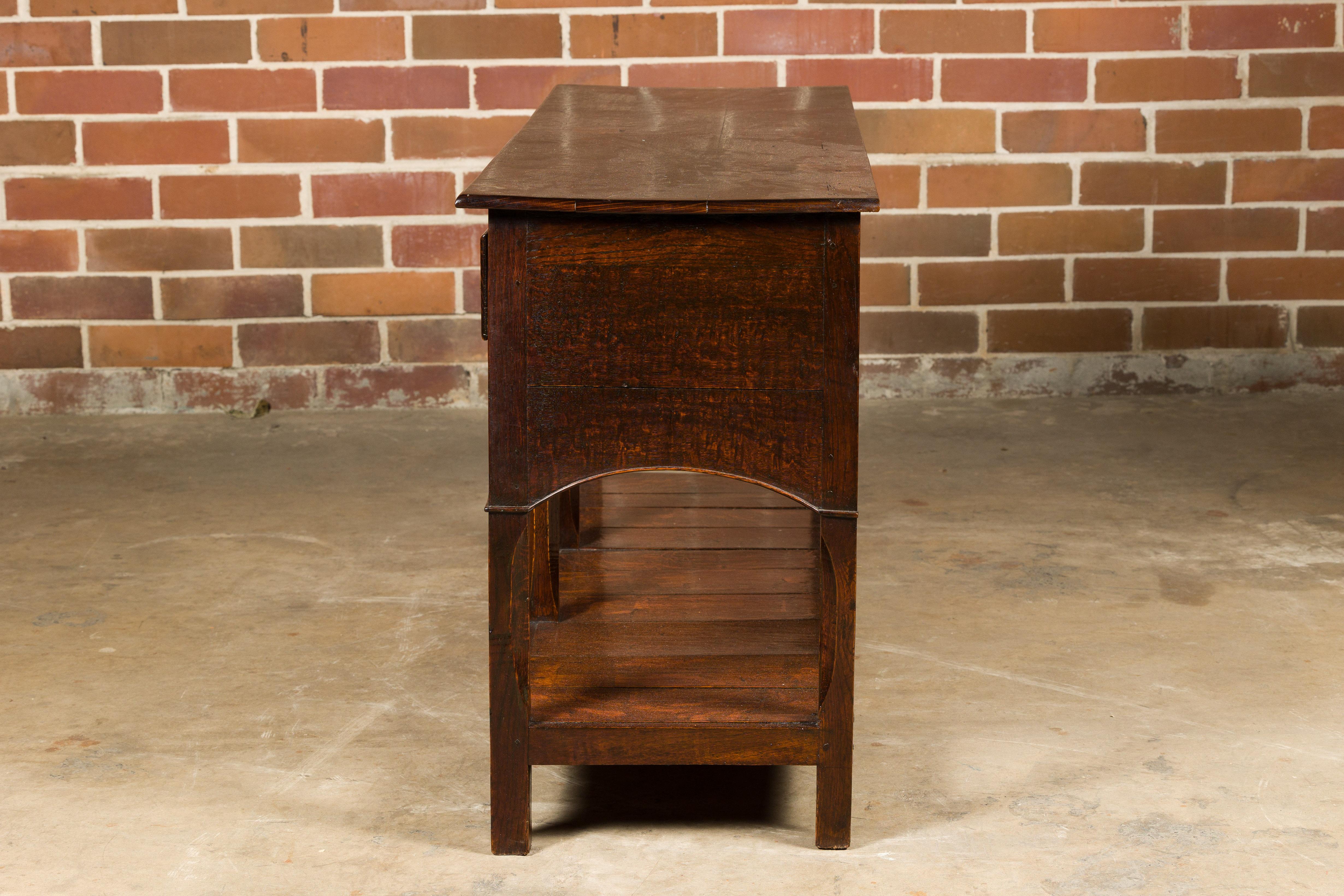 English George III 1800s Oak Dresser Base with Three Drawers and Arching Accents For Sale 8