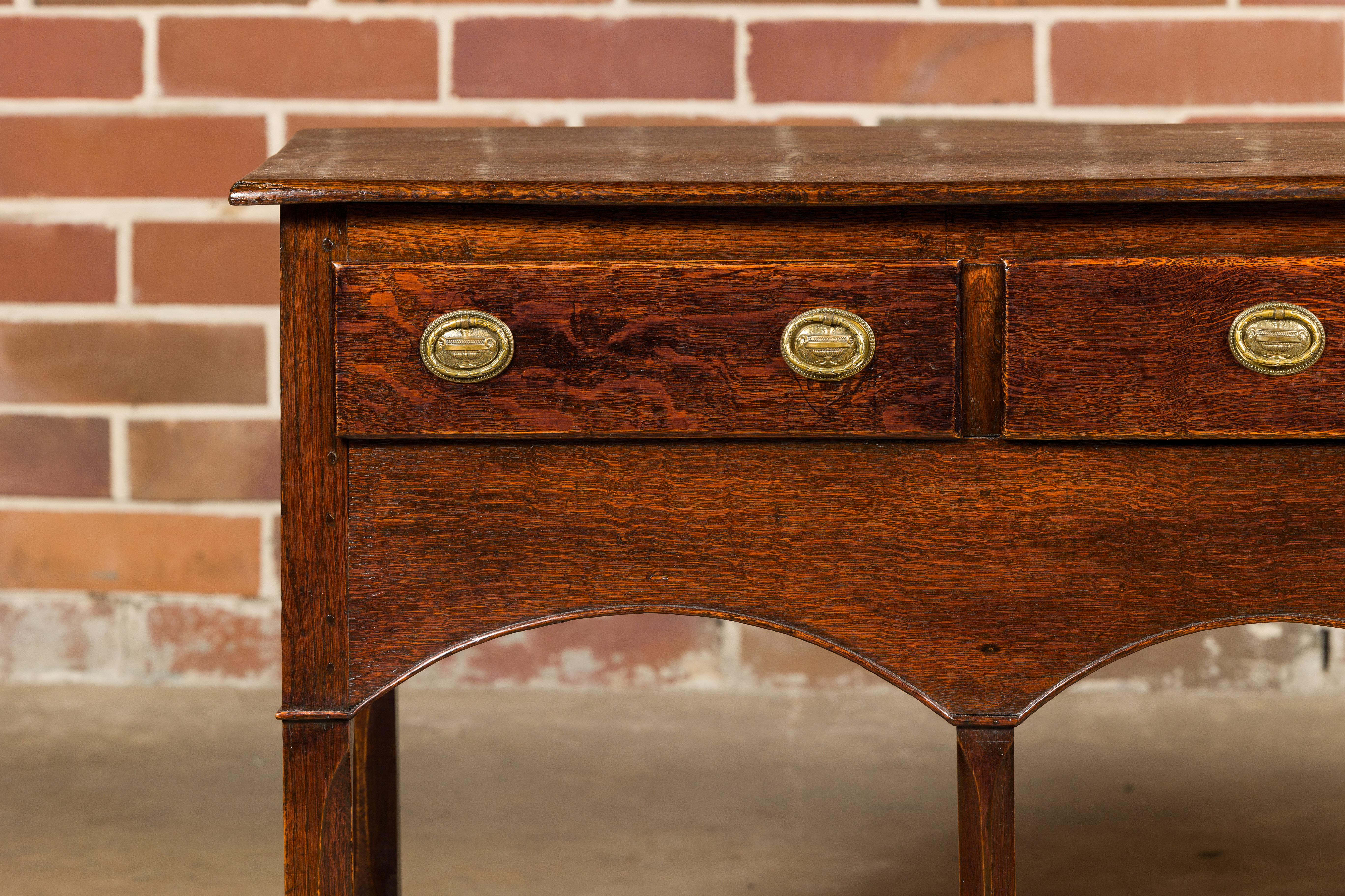 English George III 1800s Oak Dresser Base with Three Drawers and Arching Accents In Good Condition For Sale In Atlanta, GA
