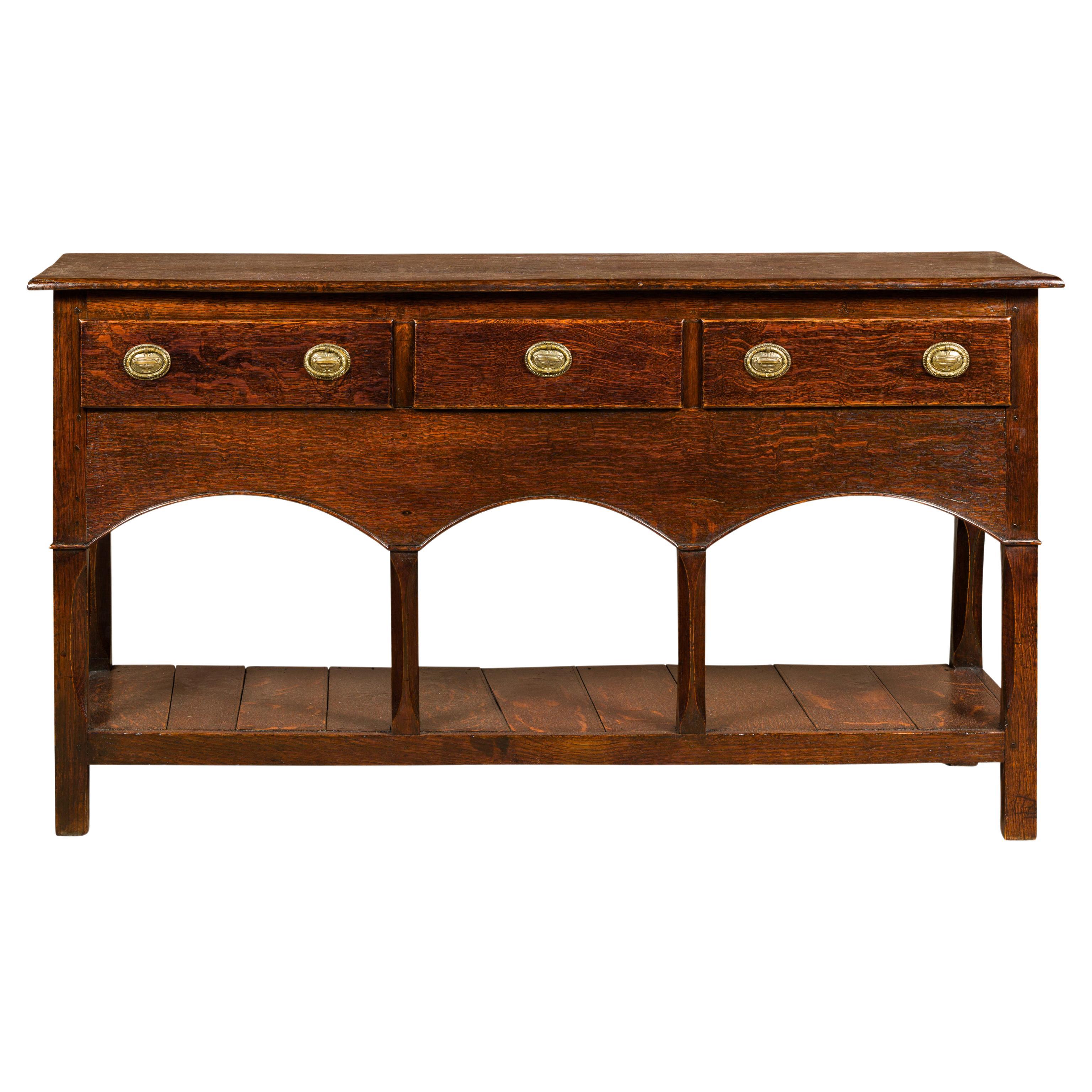English George III 1800s Oak Dresser Base with Three Drawers and Arching Accents