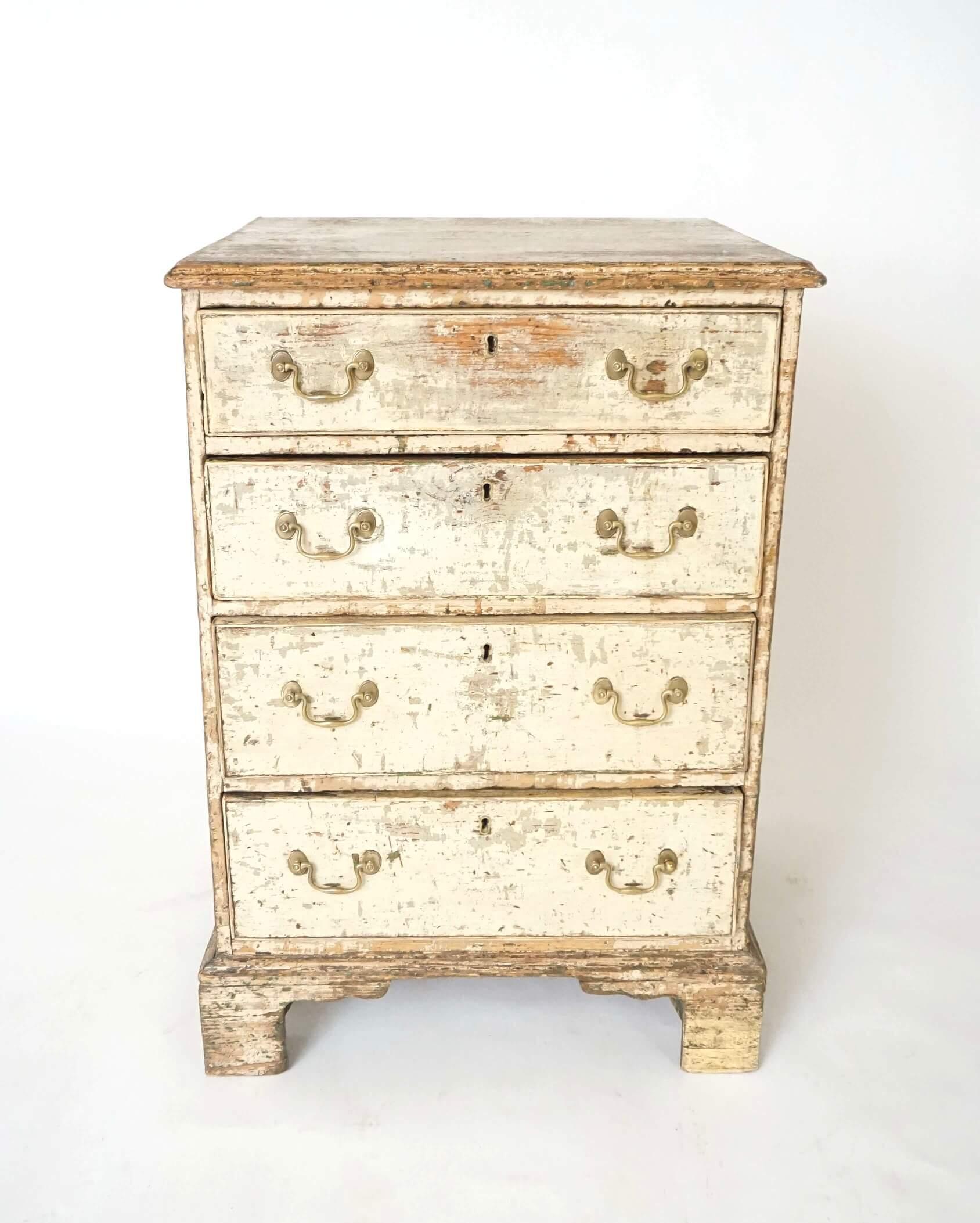 Wonderful, rare circa 1780 English George III painted chest of unusual 'tall' and 'deep' form, the pine case and four graduated drawers in 'historic' paint layers and original hardware configuration on bracket-foot base. This piece is very