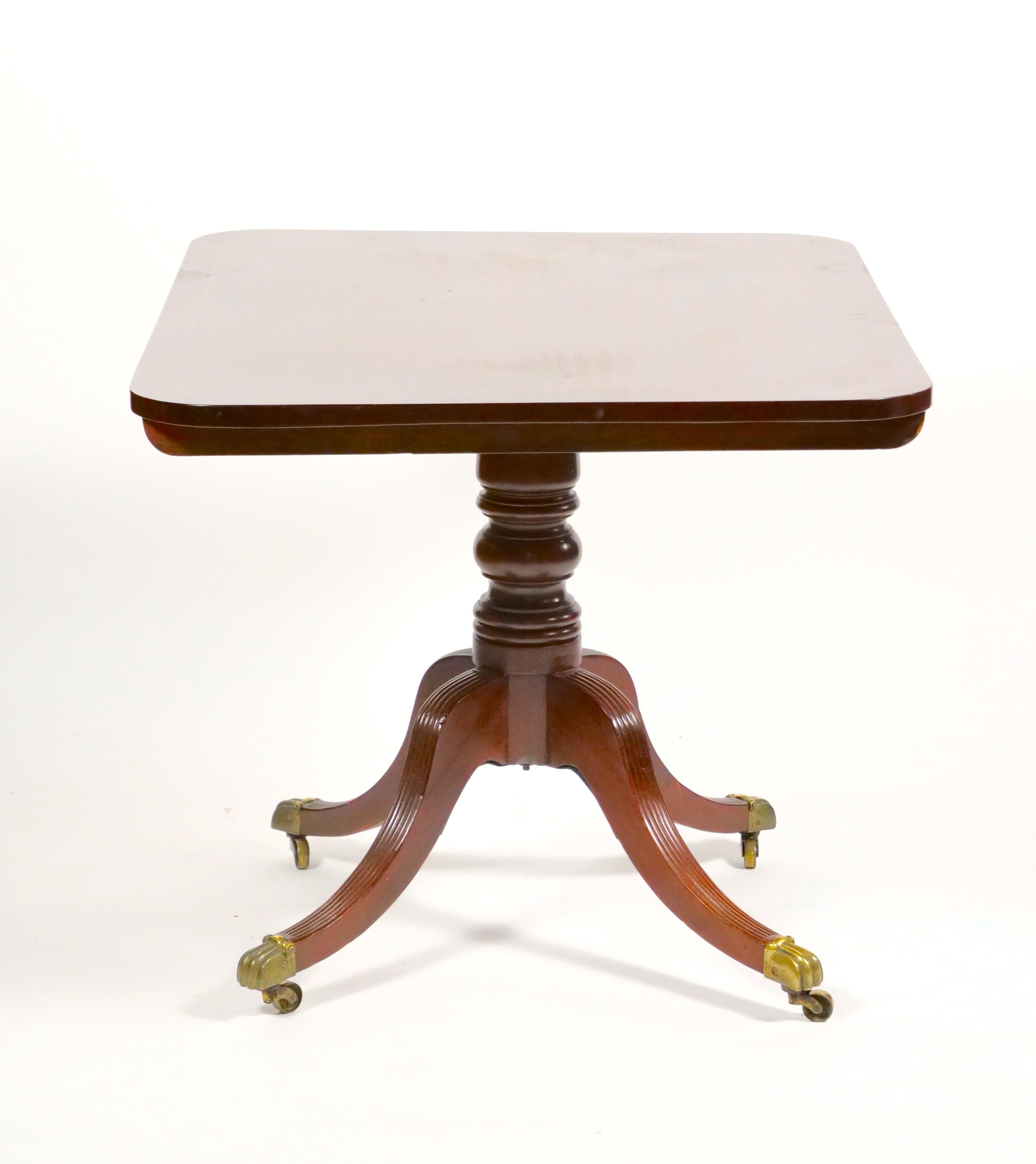 Transform your living space with this stunning 19th Century English George III Inlay Top Mahogany Wood Breakfast Table, a perfect combination of style, elegance, and functionality. This table is a testament to the craftsmanship and design of the