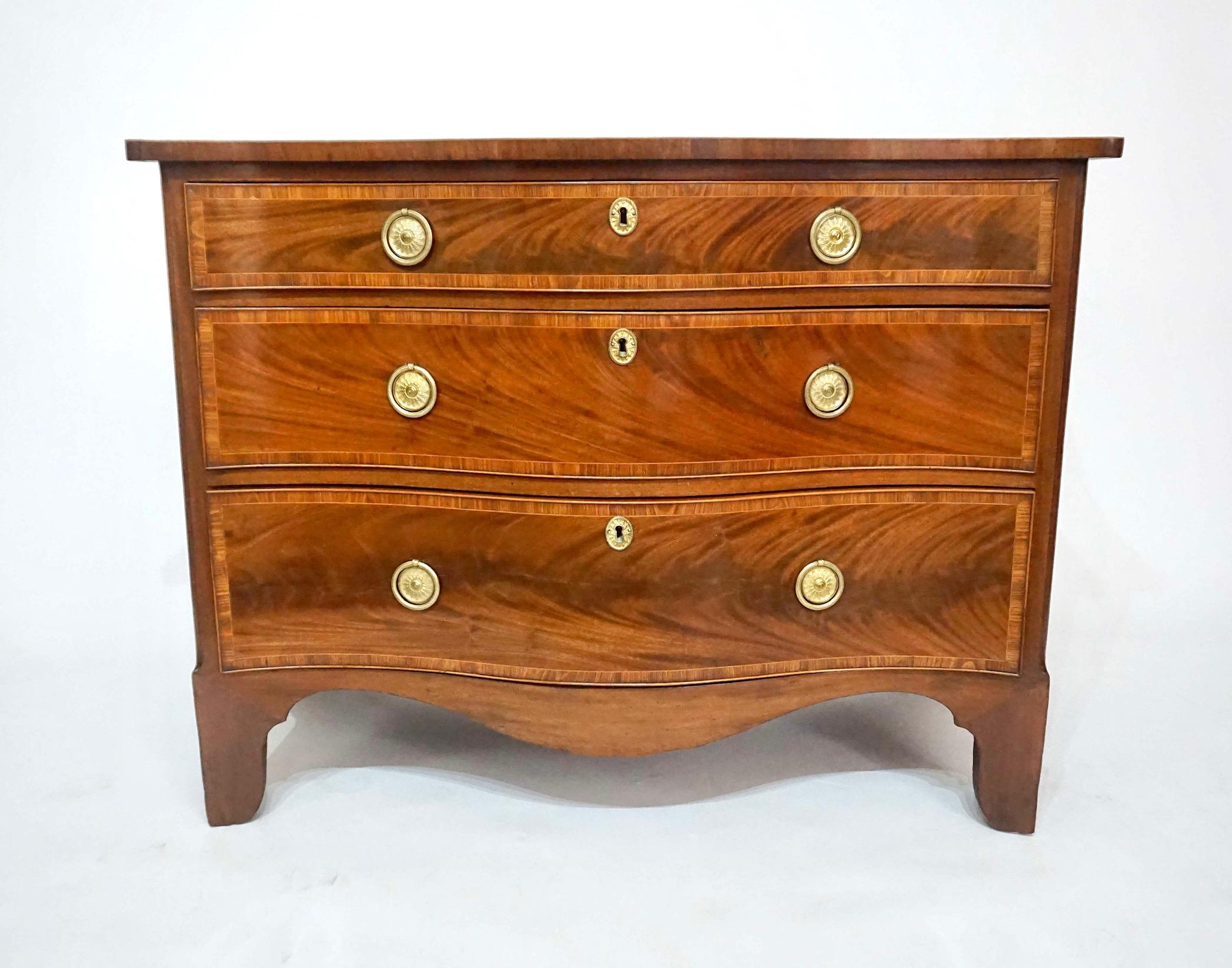 Brass George III Mahogany, Kingwood, and Satinwood Serpentine Commode, circa 1785 For Sale