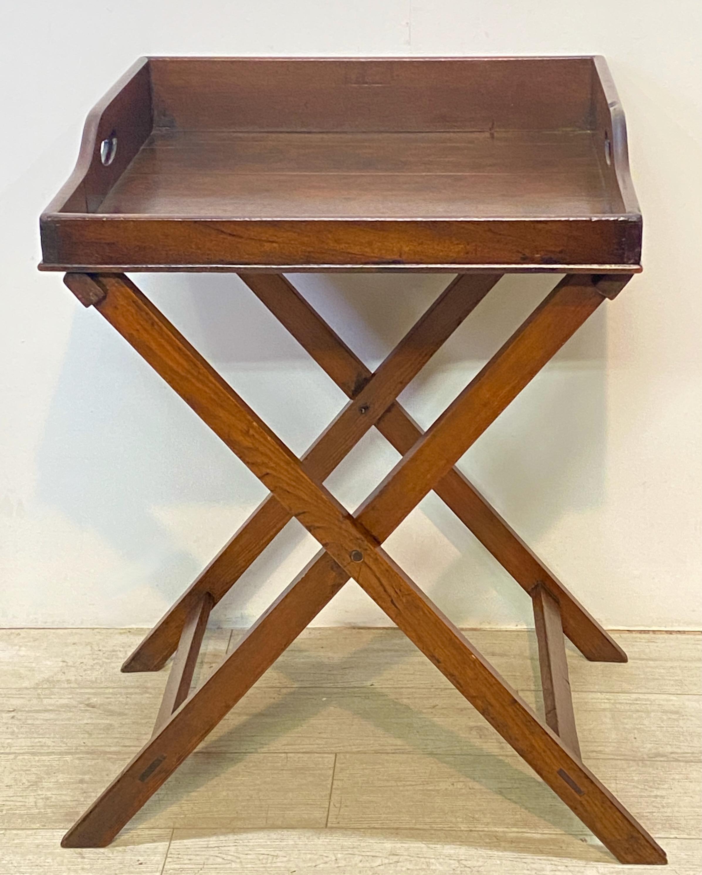 Early 19th century Regency George III period mahogany butler's tray on folding stand.
Unusual square shape tray as these are mostly rectangle in shape.
Beautiful old patina with expected signs of use adding to its character.
These always look