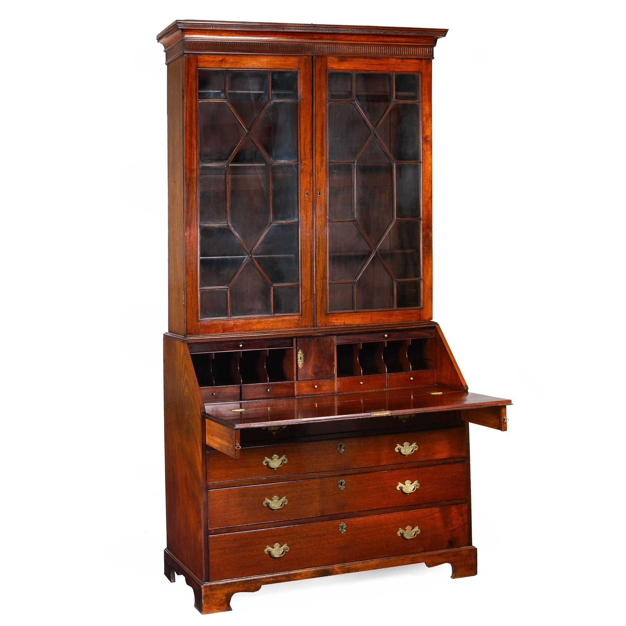GEORGE III MAHOGANY SECRETARY DESK AND BOOKCASE
England, circa last quarter of the 18th century
Item # 305PKI25A 

An incredibly beautiful George III mahogany fall-front secretary desk and bookcase, it has remained in a private collection for nearly