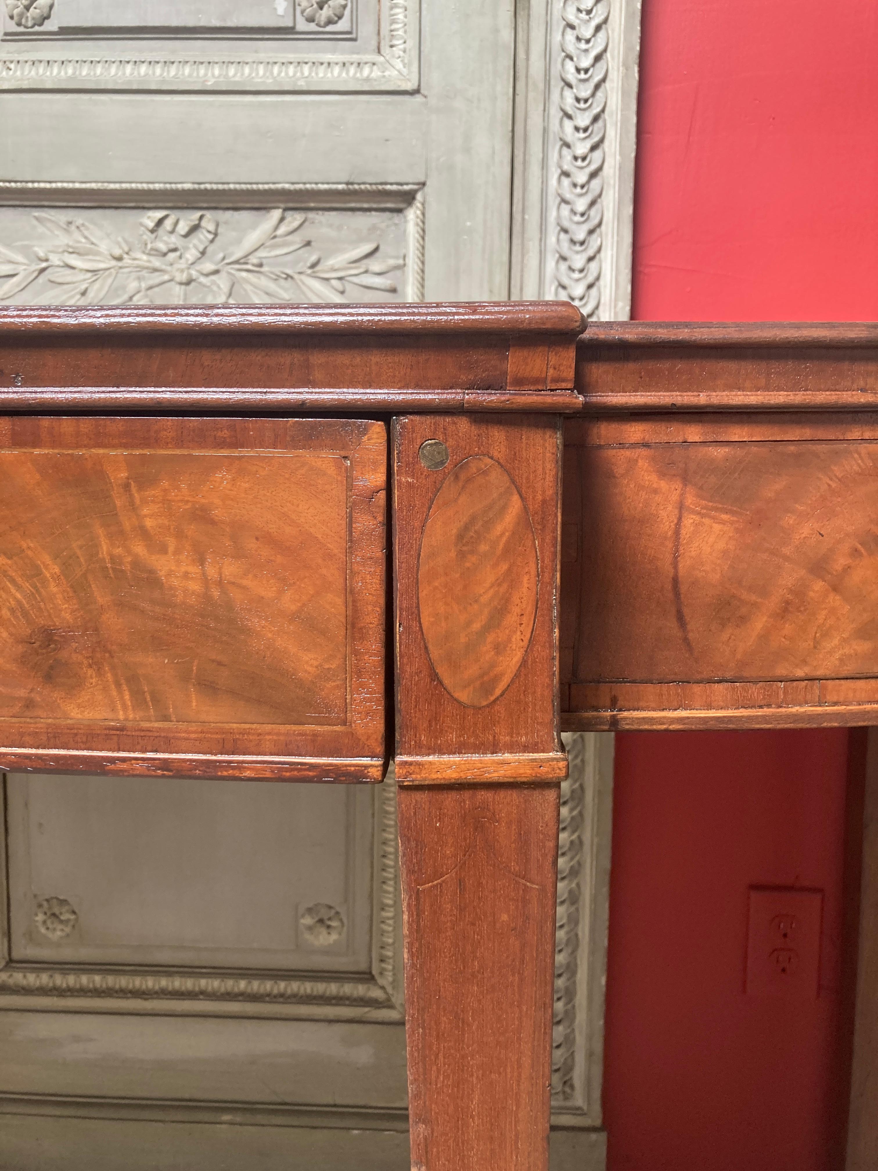An early 19th century George III mahogany sideboard, server with three drawers and a beautiful plum pudding mahogany top. 
 