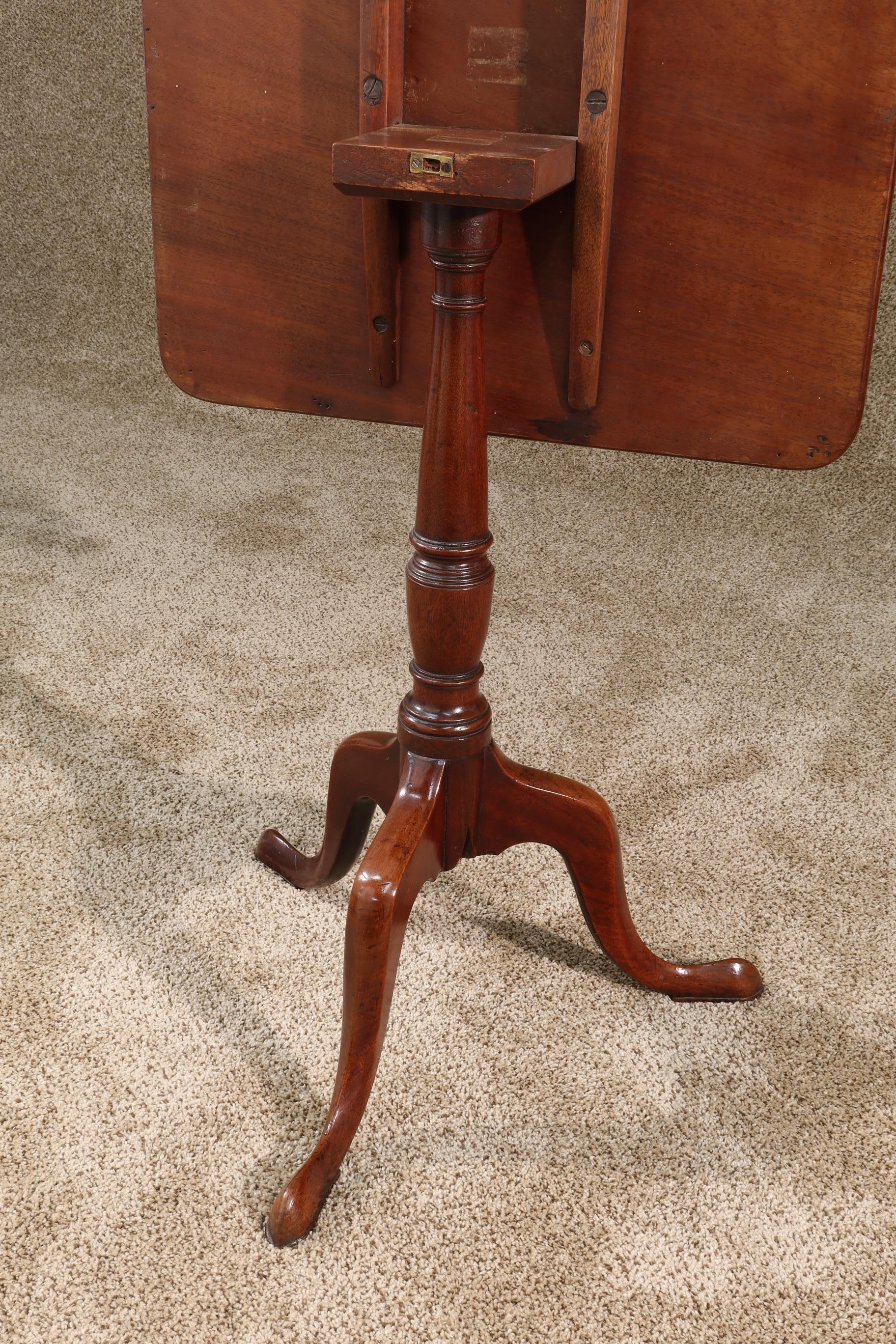 Antique English George III mahogany tilt-top tripod wine table with unusual well figured square top. In excellent condition and retains a wonderful finish, circa 1790.
