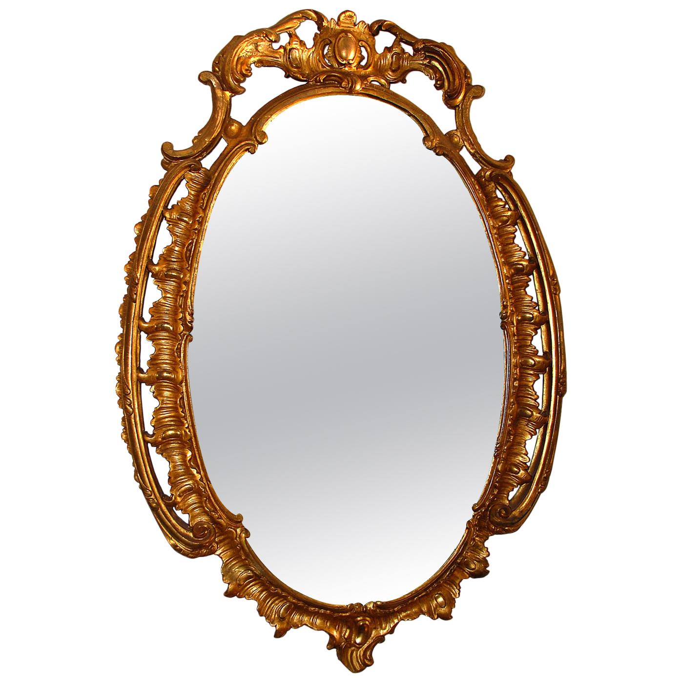Englischer Spiegel aus der George-III-Periode:: geschnitzt:: oval:: Blattgold:: mit Wellen- und Blattmotiven
