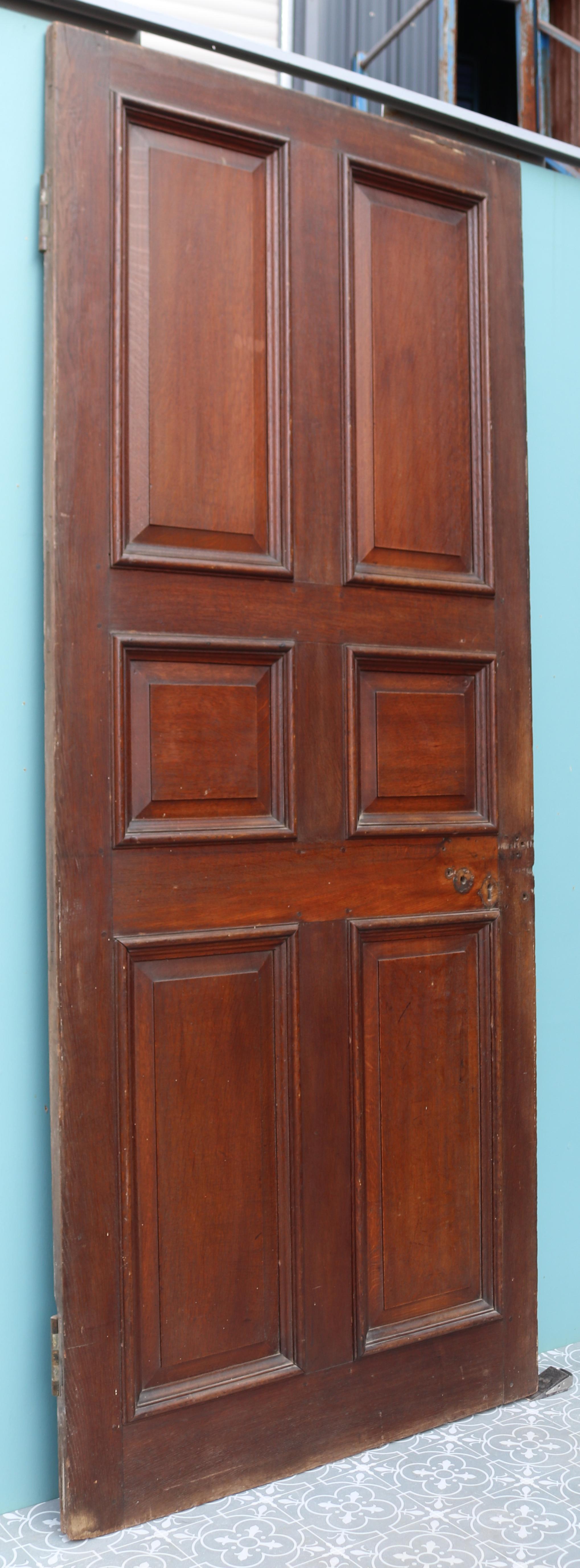 A good quality peg jointed door with raised and fielded panels. Salvaged from a property near Brighton. We currently have three similar doors and two panels available.