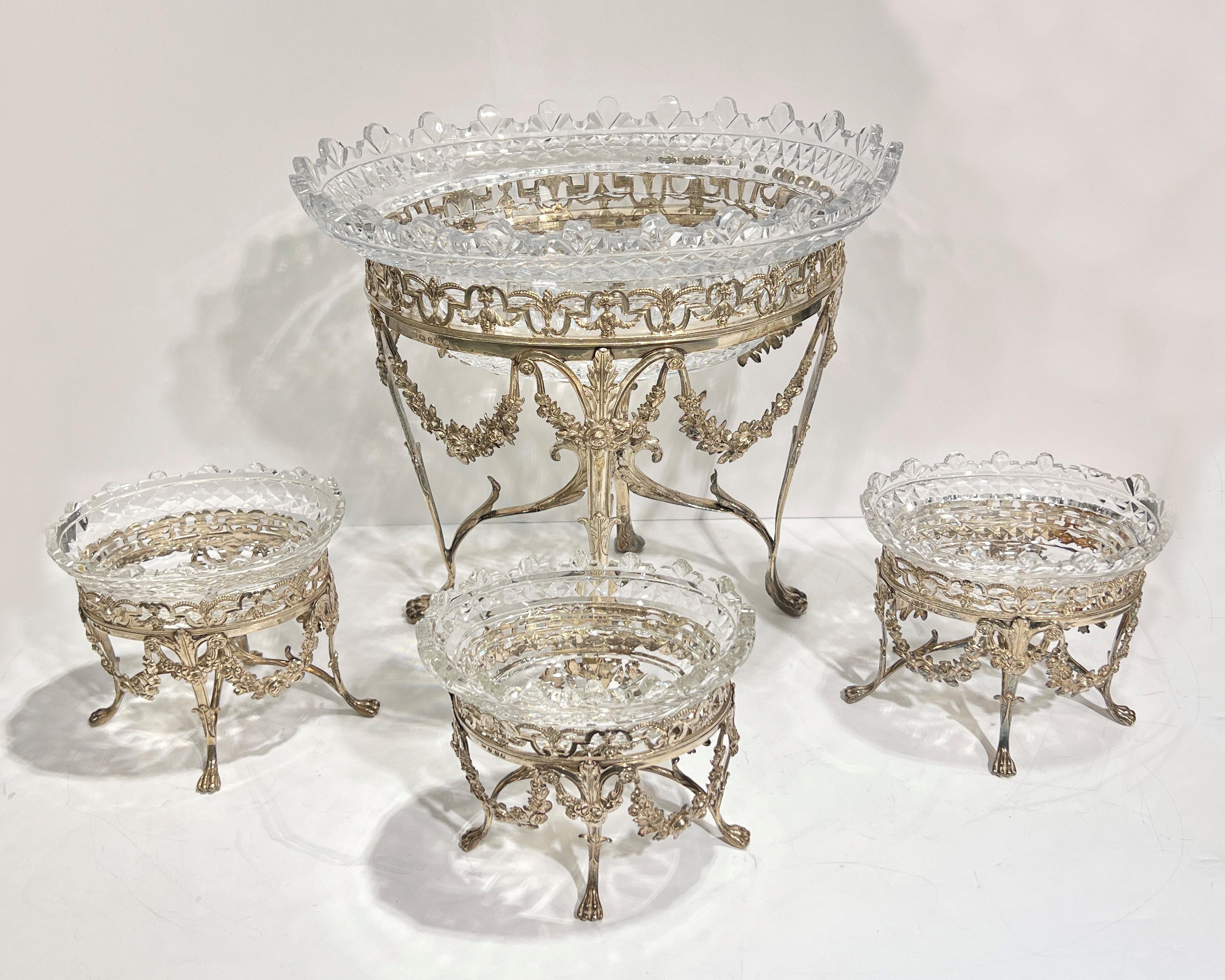 Exceptional English antique Georgian (George III) period sterling silver epergne centerpiece bowl with three smaller matching bowls on stands with H date code for 1803, sterling and London marks, and indistinct maker's mark.   The centerpiece 11 3/4