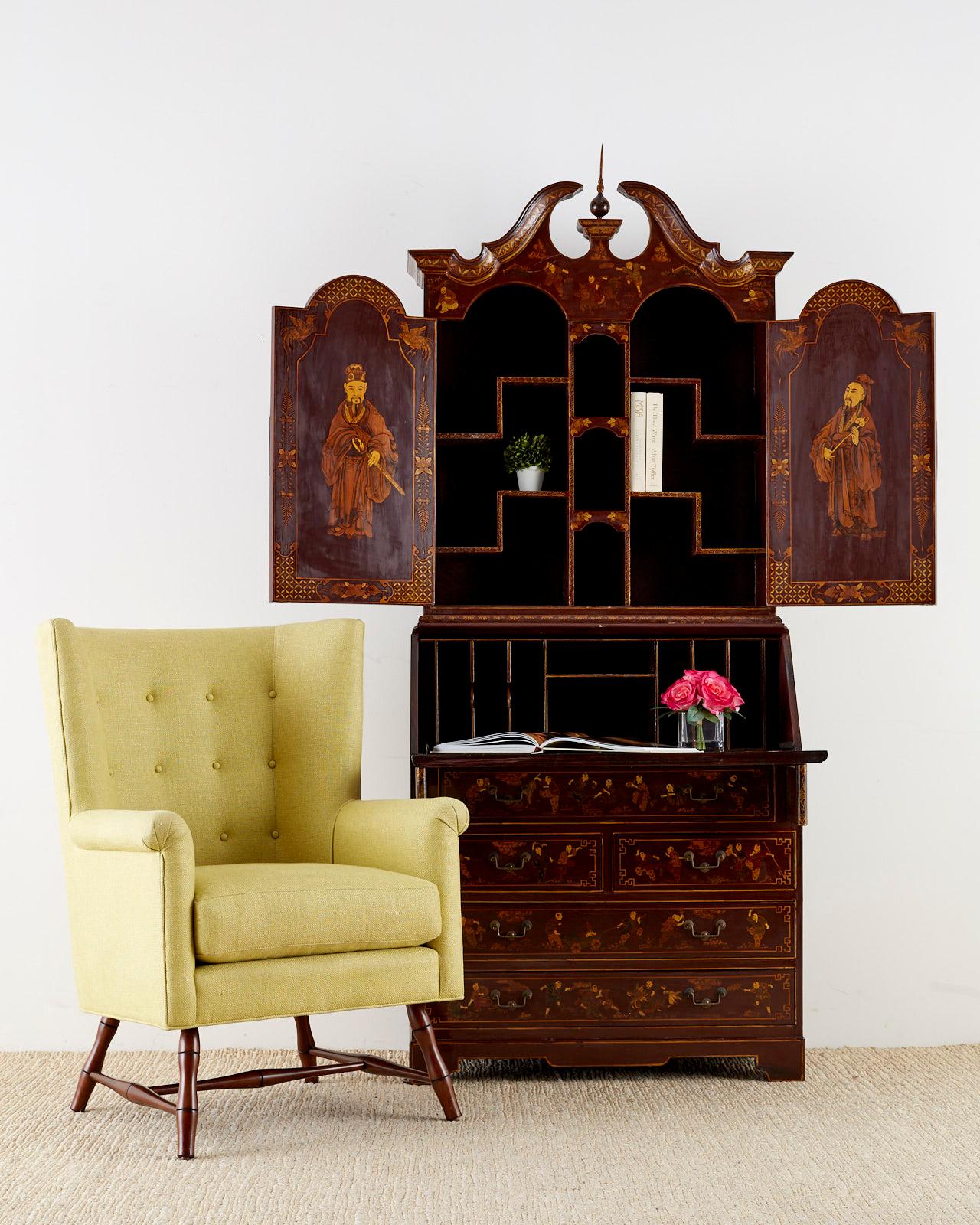 Late 19th century English chinoiserie secretary bookcase made in the George III taste. Two part secretaire hand painted with a polychrome gilt lacquer finish. Decorated in the chinoiserie revival period of the mid-19th century through the early 20th