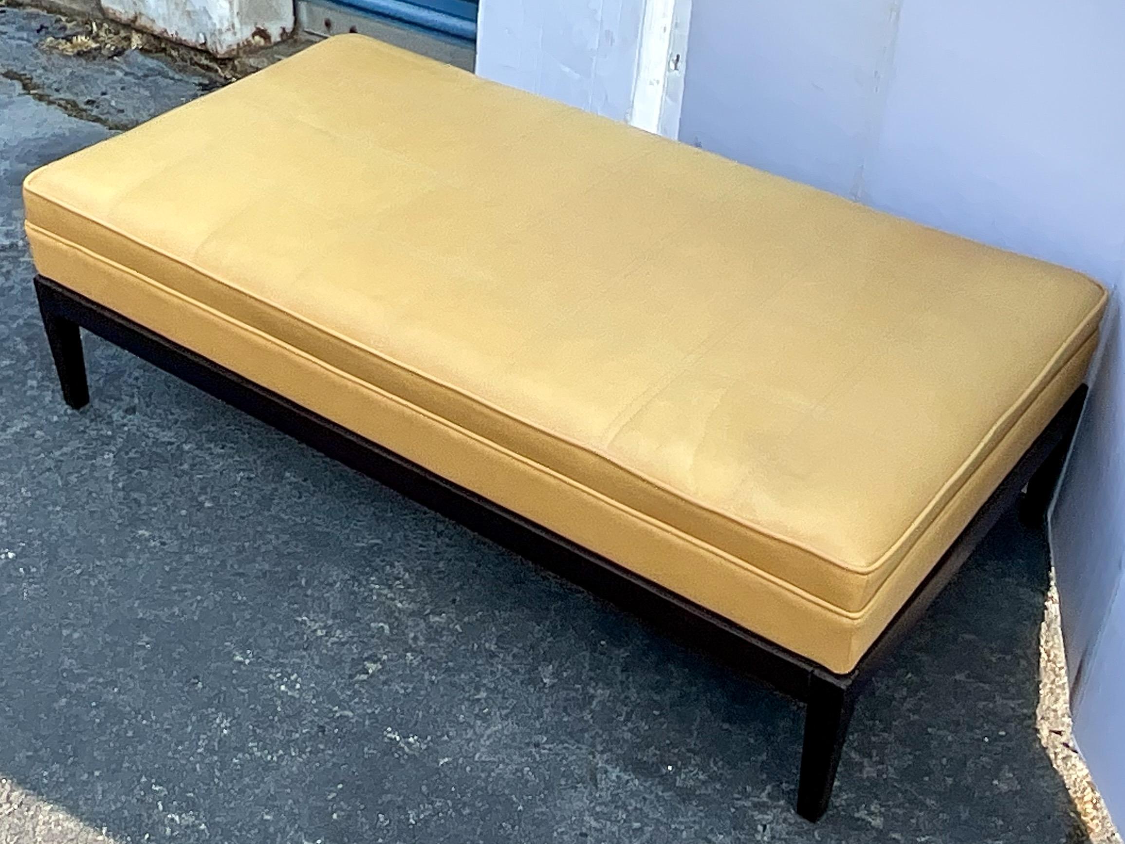 This is a George Smith hand crafted upholstered leather ottoman / coffee table. George Smith was a late 18th century British upholsterer to the royalty of the day. It was known then as it is today for its craftsmanship and quality materials. It is