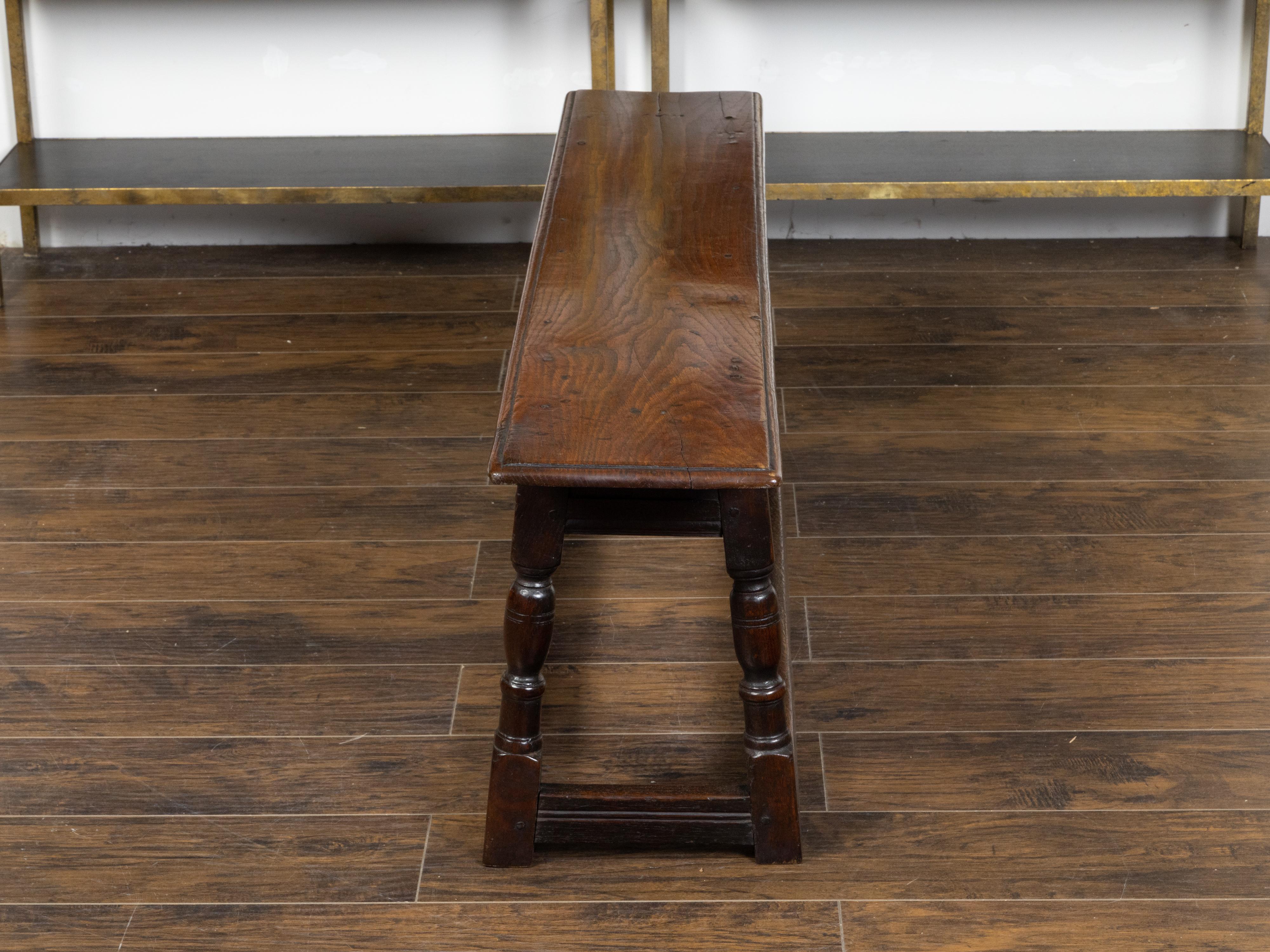 19th Century English Georgian 1820s Oak Bench with Turned Baluster Legs and Carved Apron