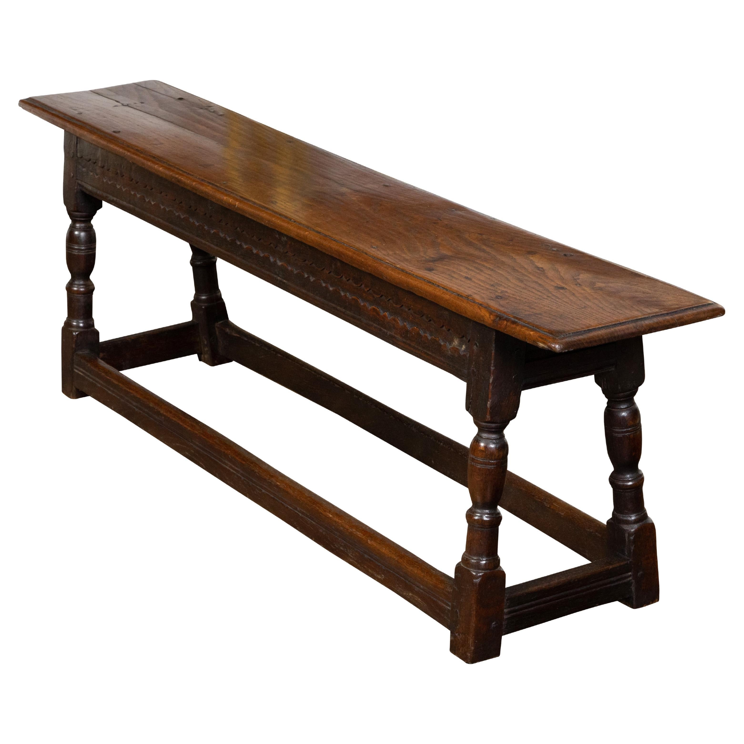 English Georgian 1820s Oak Bench with Turned Baluster Legs and Carved Apron