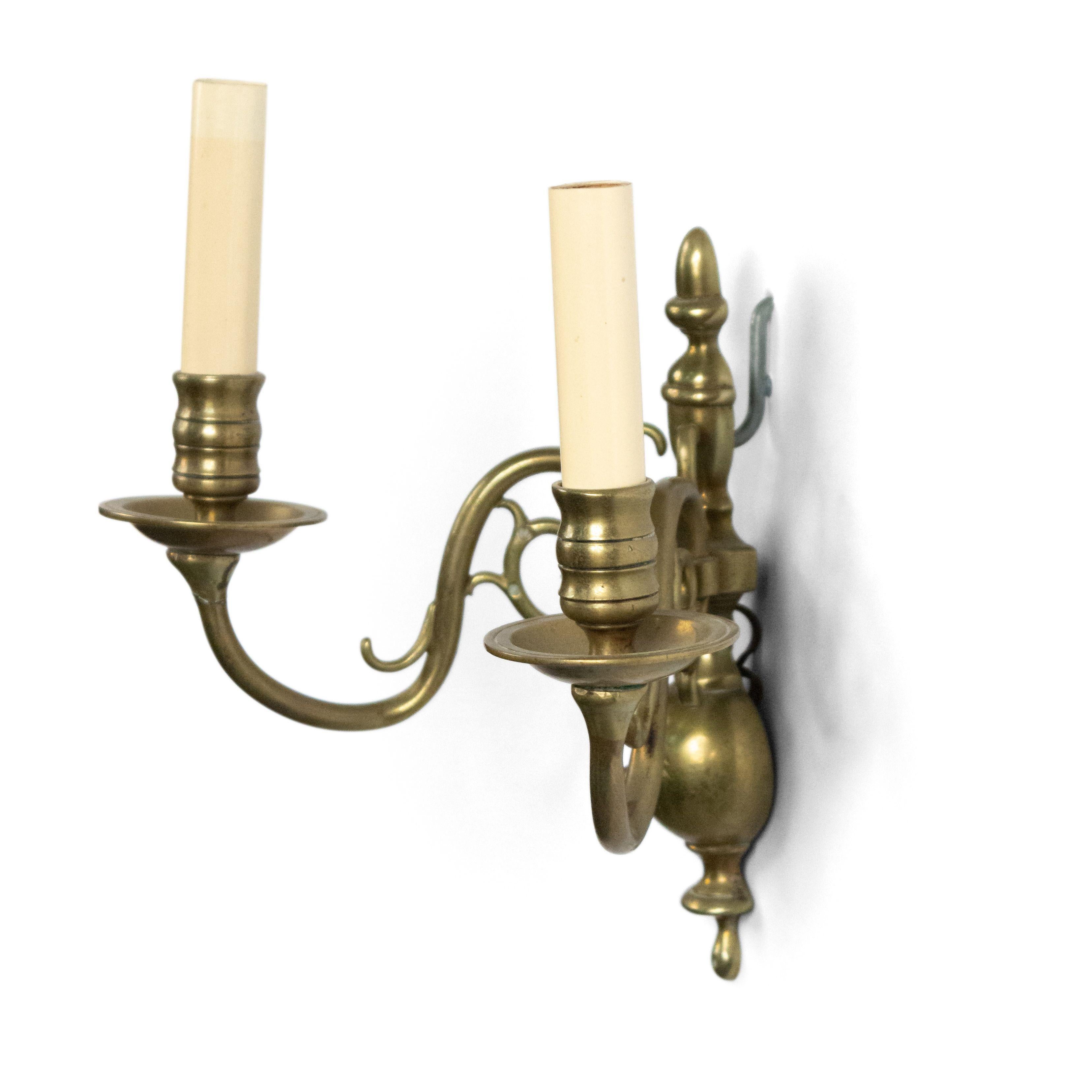 Pair of English Georgian style brass 2-arm wall sconces with scrolling arms and slender vasiform backplate, 20th century.