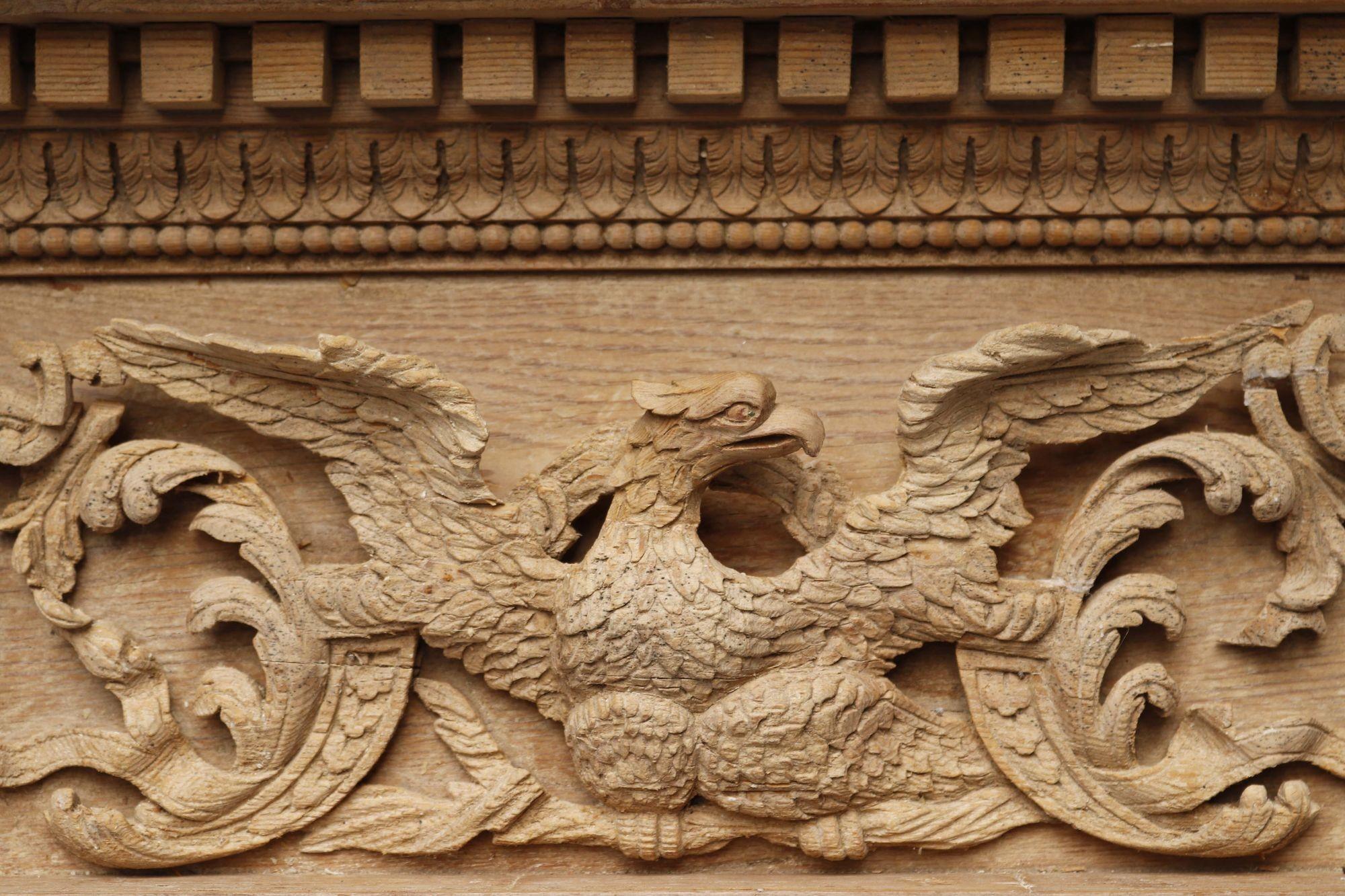 English Georgian Carved Pine Fireplace. A decorative and deeply carved fireplace carved with fruits and foliage. The frieze carved with an eagle centrepiece, foliage and pomegranates.


Additional Dimensions


Opening height 111 cm


Opening width
