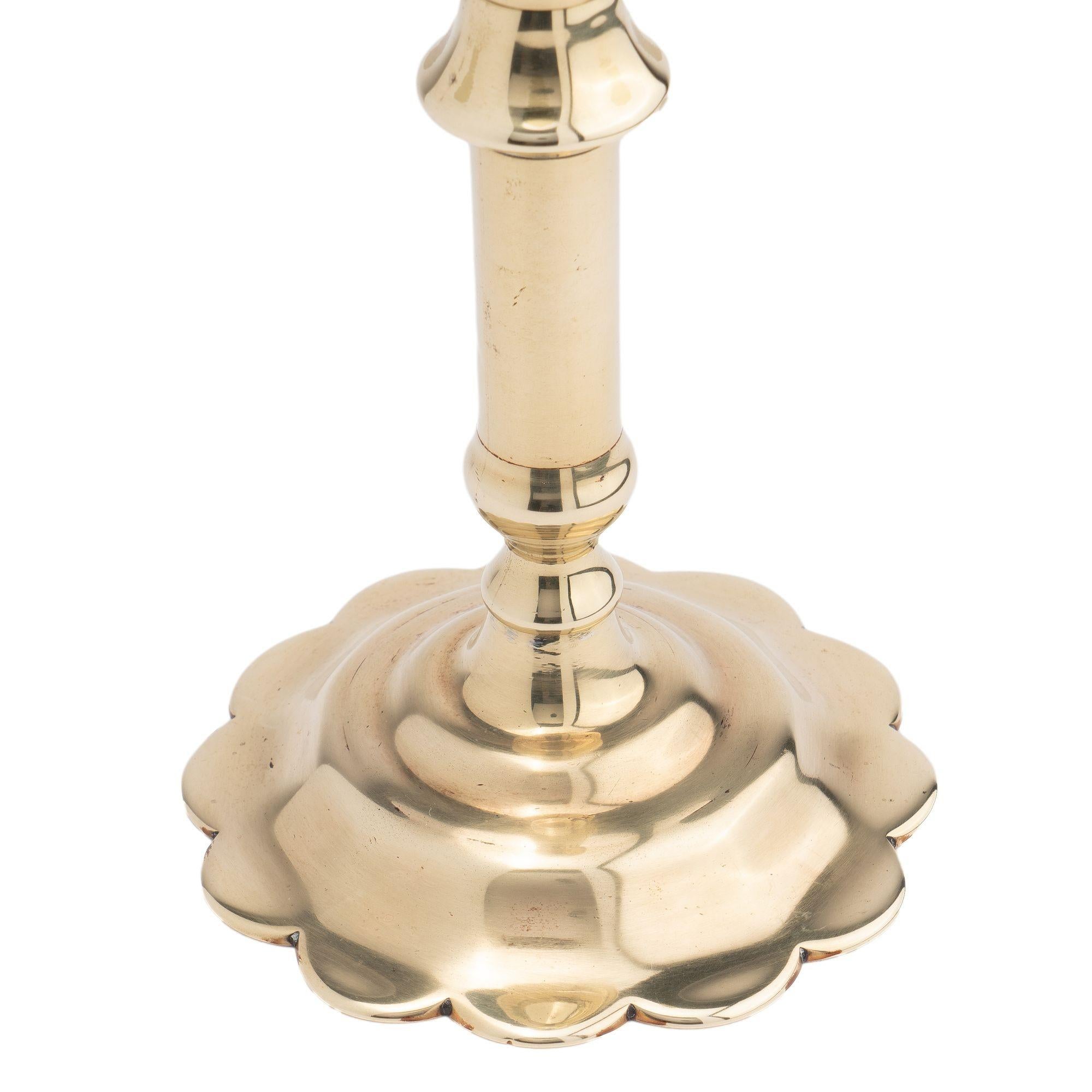 Brass English Georgian cast brass Queen Anne knob shaft candlestick, c. 1760 For Sale