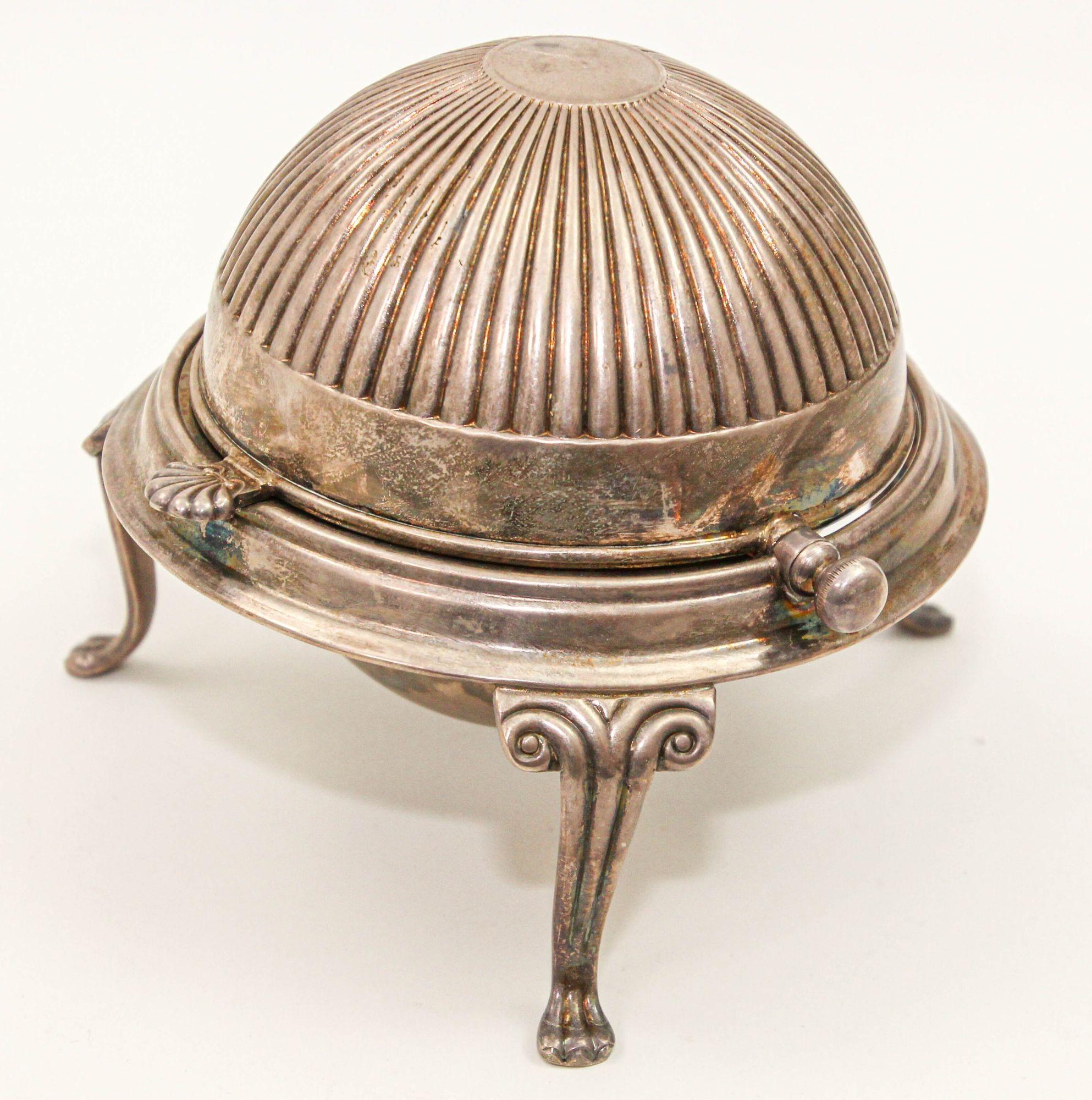 English Georgian Caviar Sheffield Silver Plate Serving Dish with Revolving Lid Circa 1940.
Vintage silver plated metal roll top globe dome container box, could be use to serve caviar or sugar.
Silver Server designed as a sphere shape Roll Top Caviar