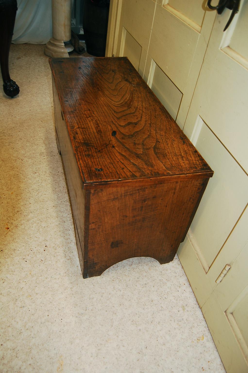 English Georgian elm six board blanket chest with original shaped feet, wrought iron strap hinges, lift top.  This 36