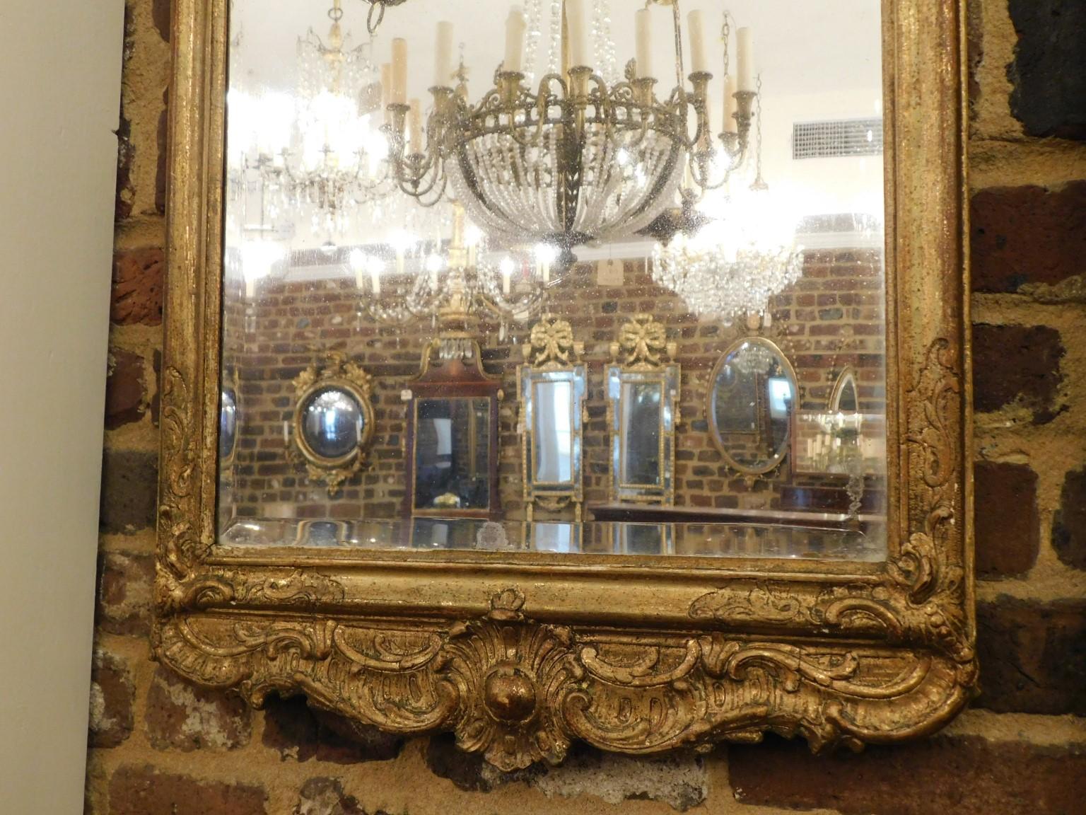 Gesso English Georgian Foliage Crest Medallion Gilt Wood Beveled Wall Mirror, C. 1750 For Sale