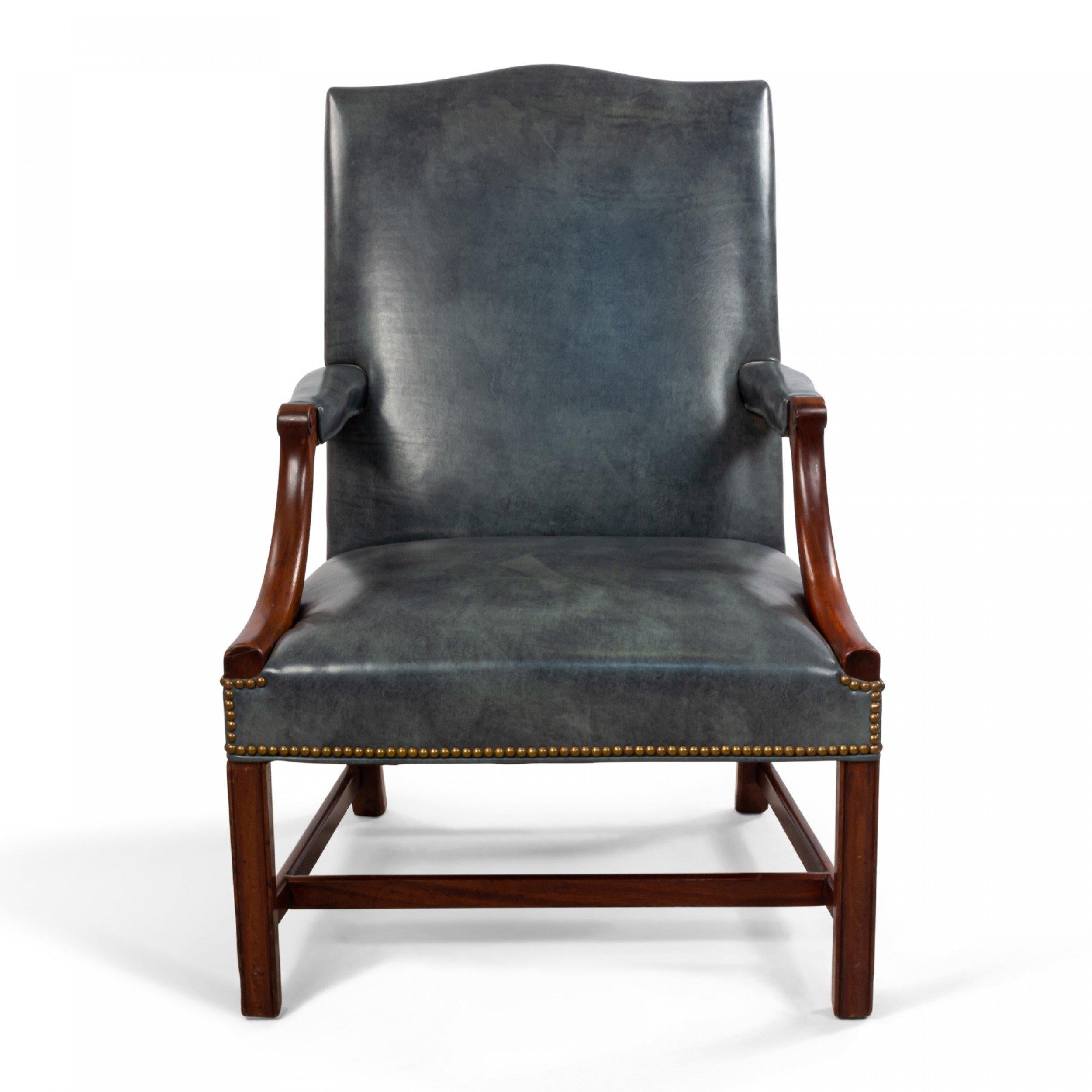 English Georgian style (20th century) mahogany open armchair with shaped back and upholstered in a leather style blue/grey.