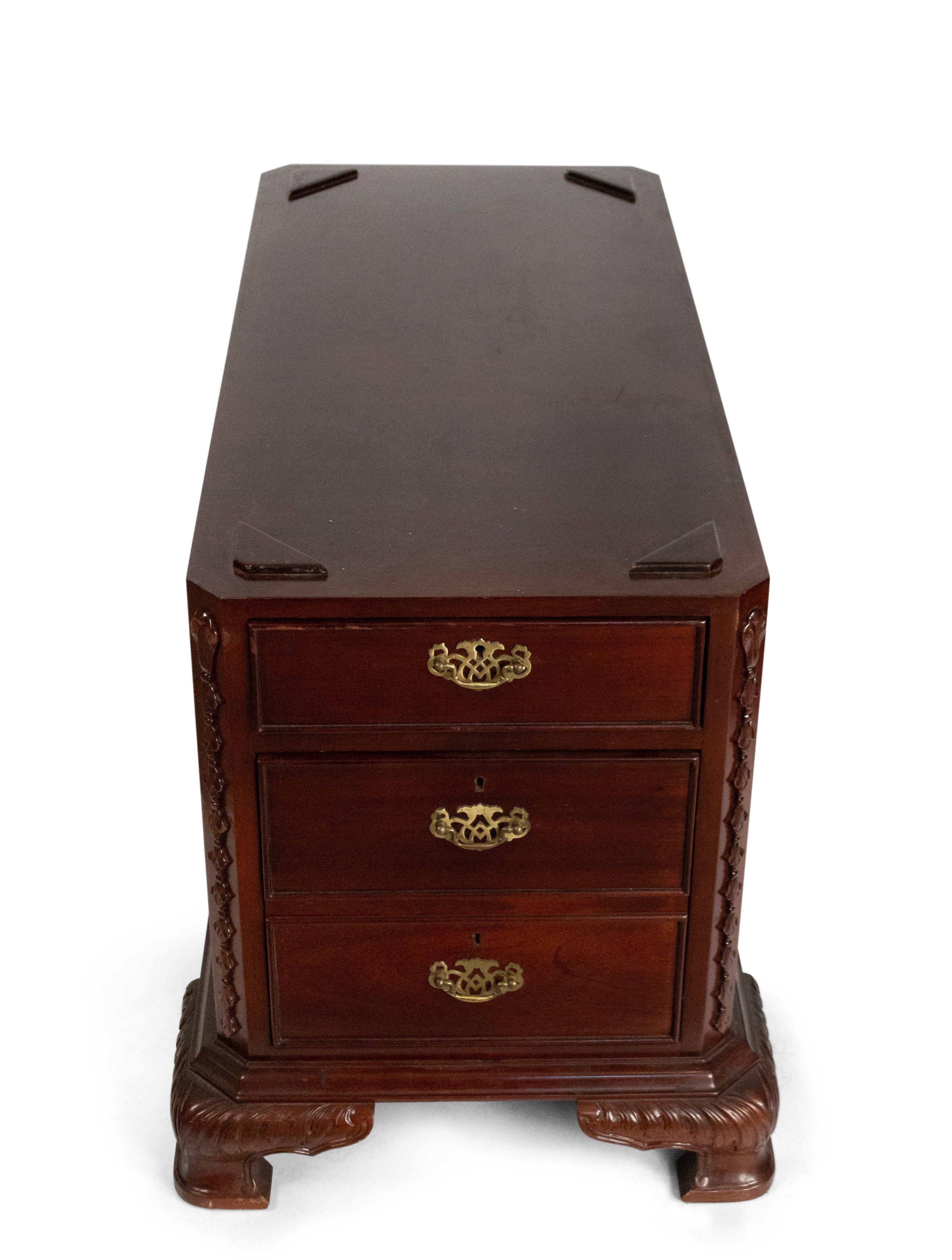 20th century English Georgian style mahogany kneehole partner's desk with 3 sections and burgundy leather top.