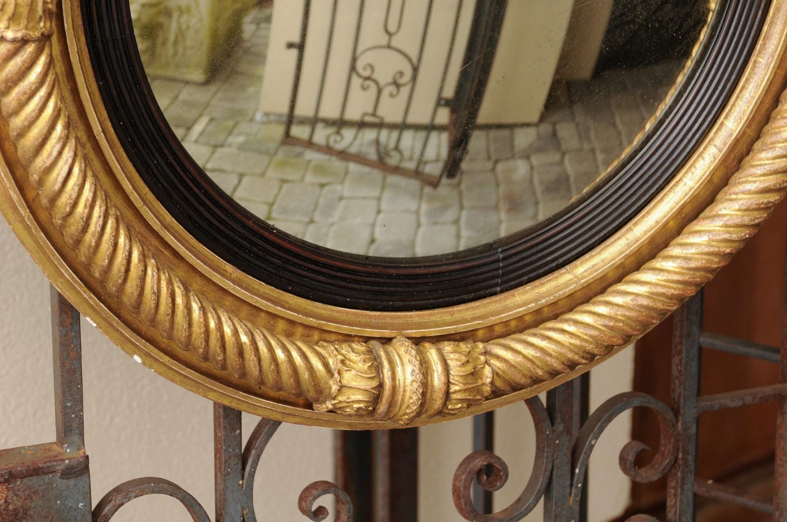 English Georgian Period 1820s Giltwood Convex Mirror with Twisted Rope Motifs 1