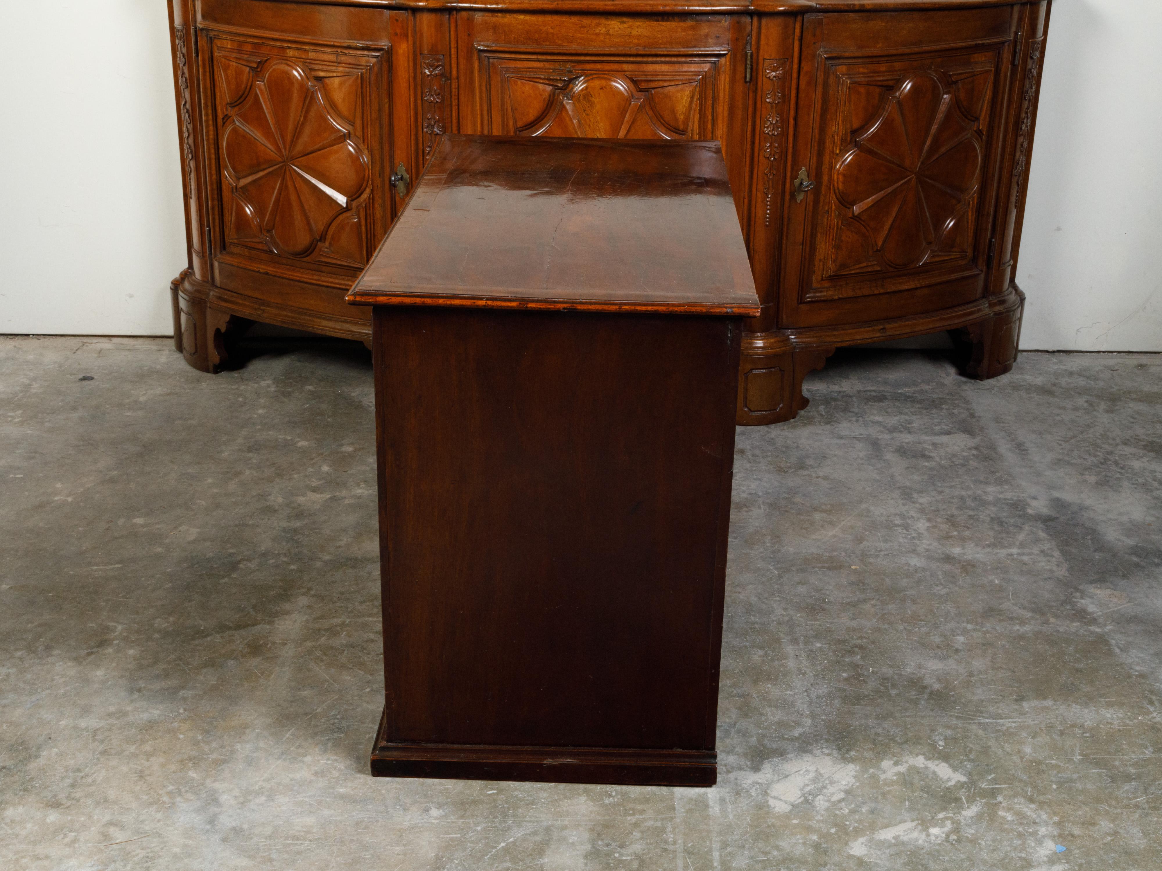 19th Century English Georgian Period Mahogany Desk with Ten Graduating Drawers and Shelf For Sale