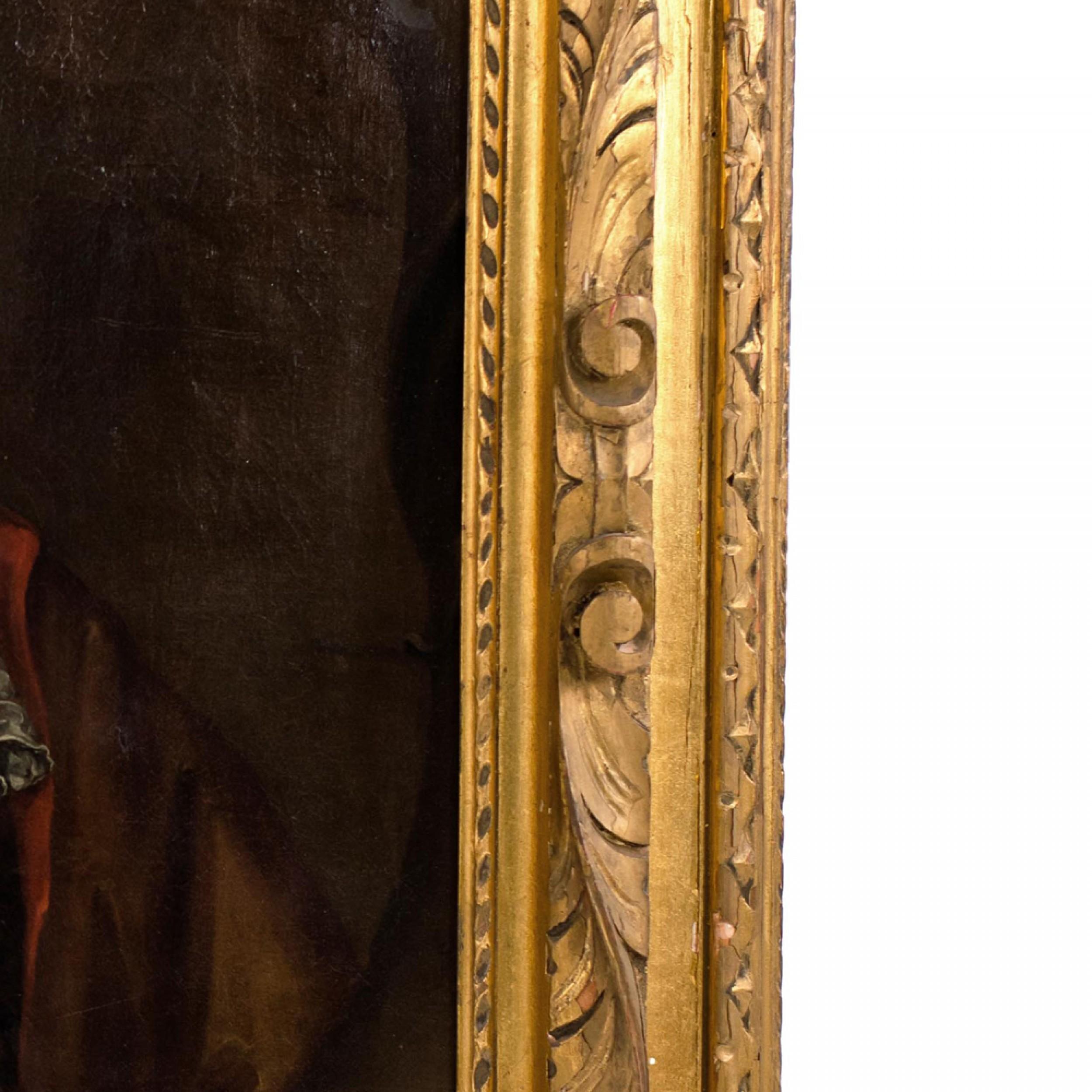 Gilt framed oil painting portrait of 18th Century man wearing white scarf and brown robe.